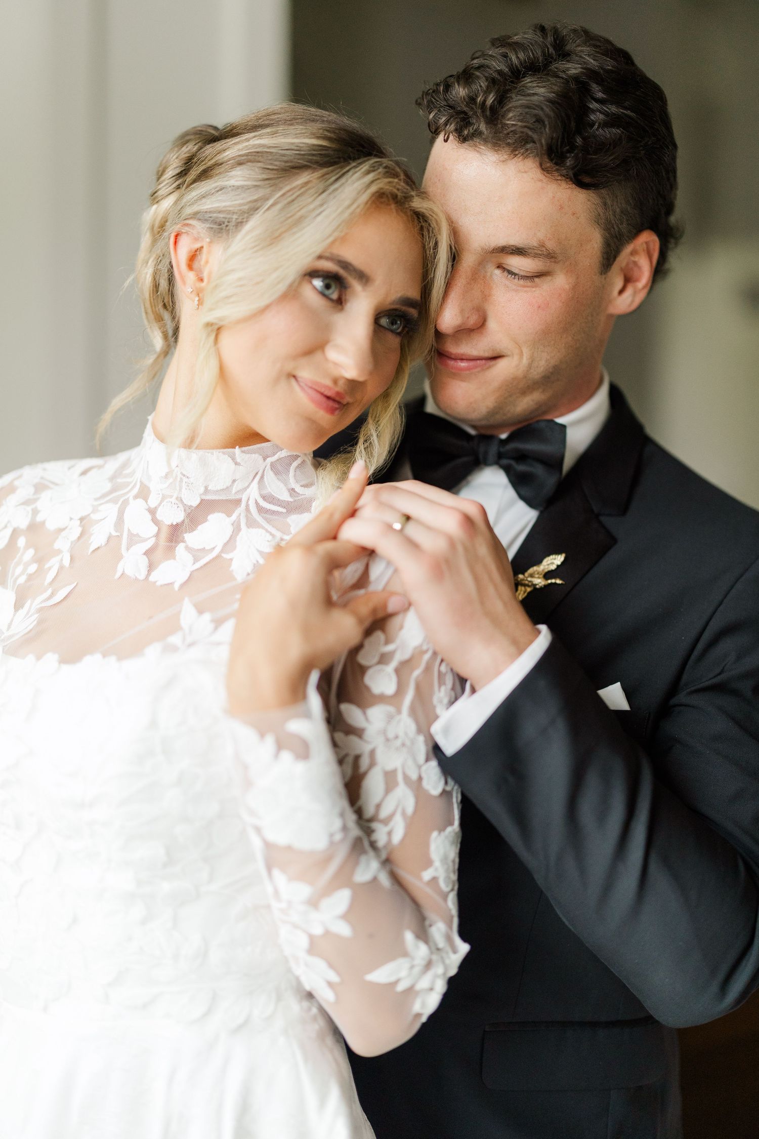 Romantic wedding portrait series showing tender moments between newlyweds in formal attire.