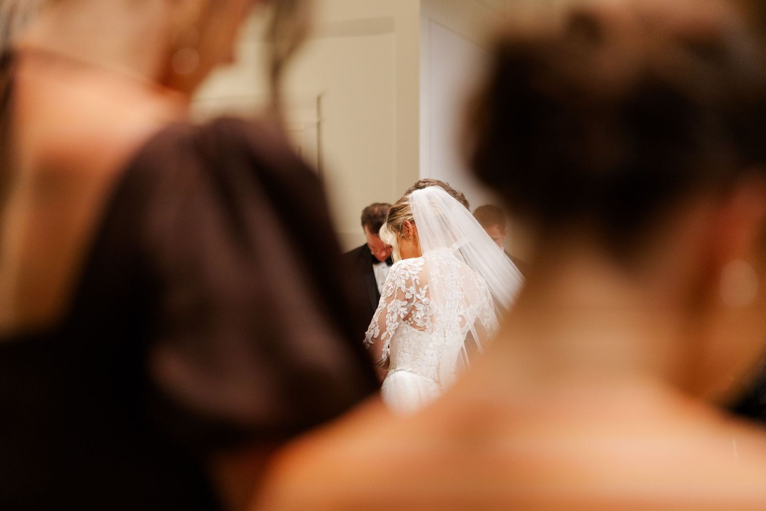 Soft focus detail shot of wedding ceremony preparations.