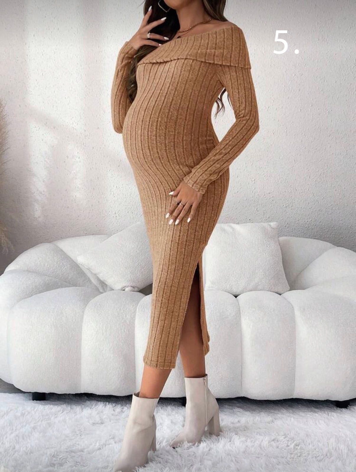 Cozy maternity photos showing a ribbed tan sweater dress on white furniture.