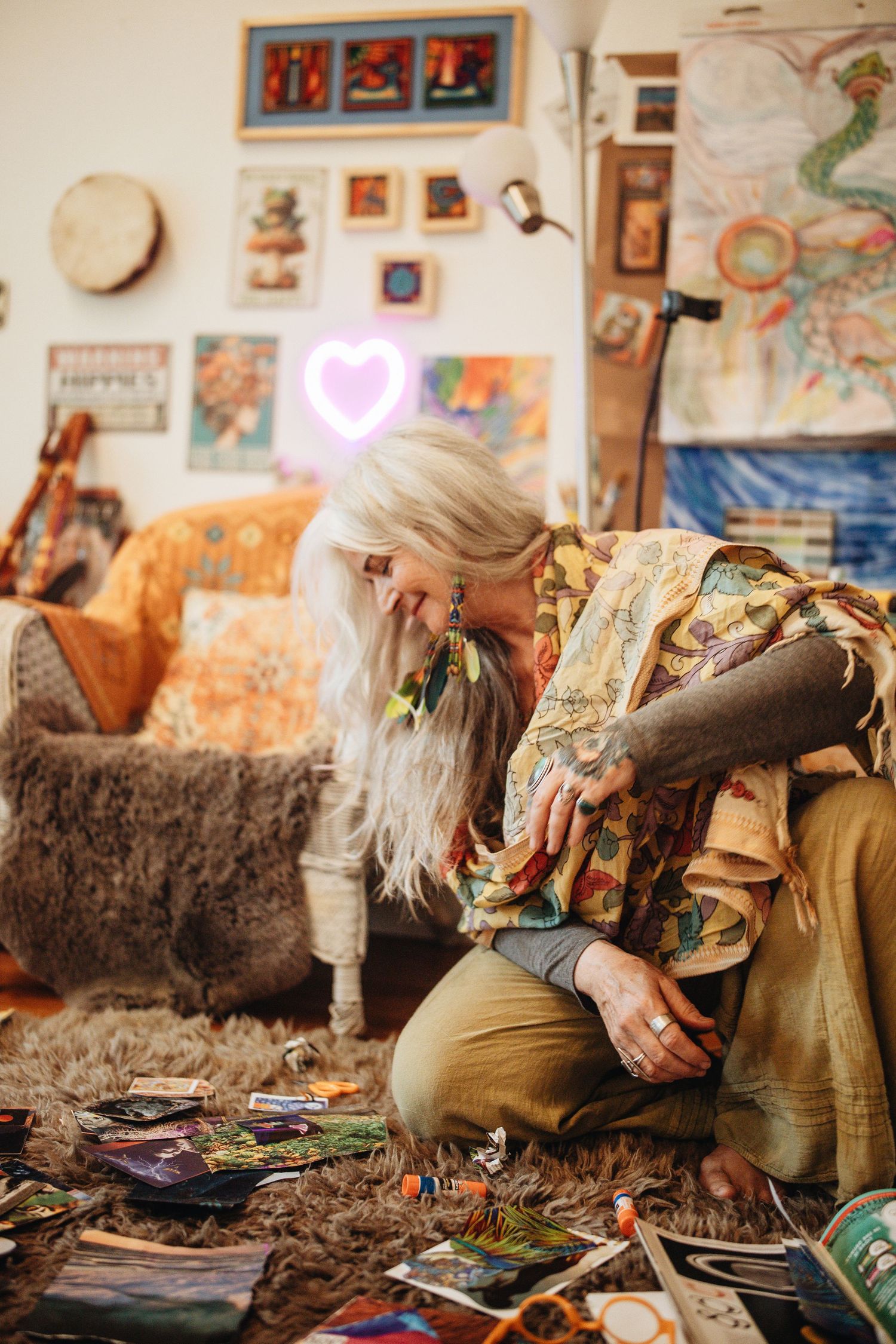 Bohemian style room with eclectic wall art and cozy textiles creating a spiritual atmosphere.