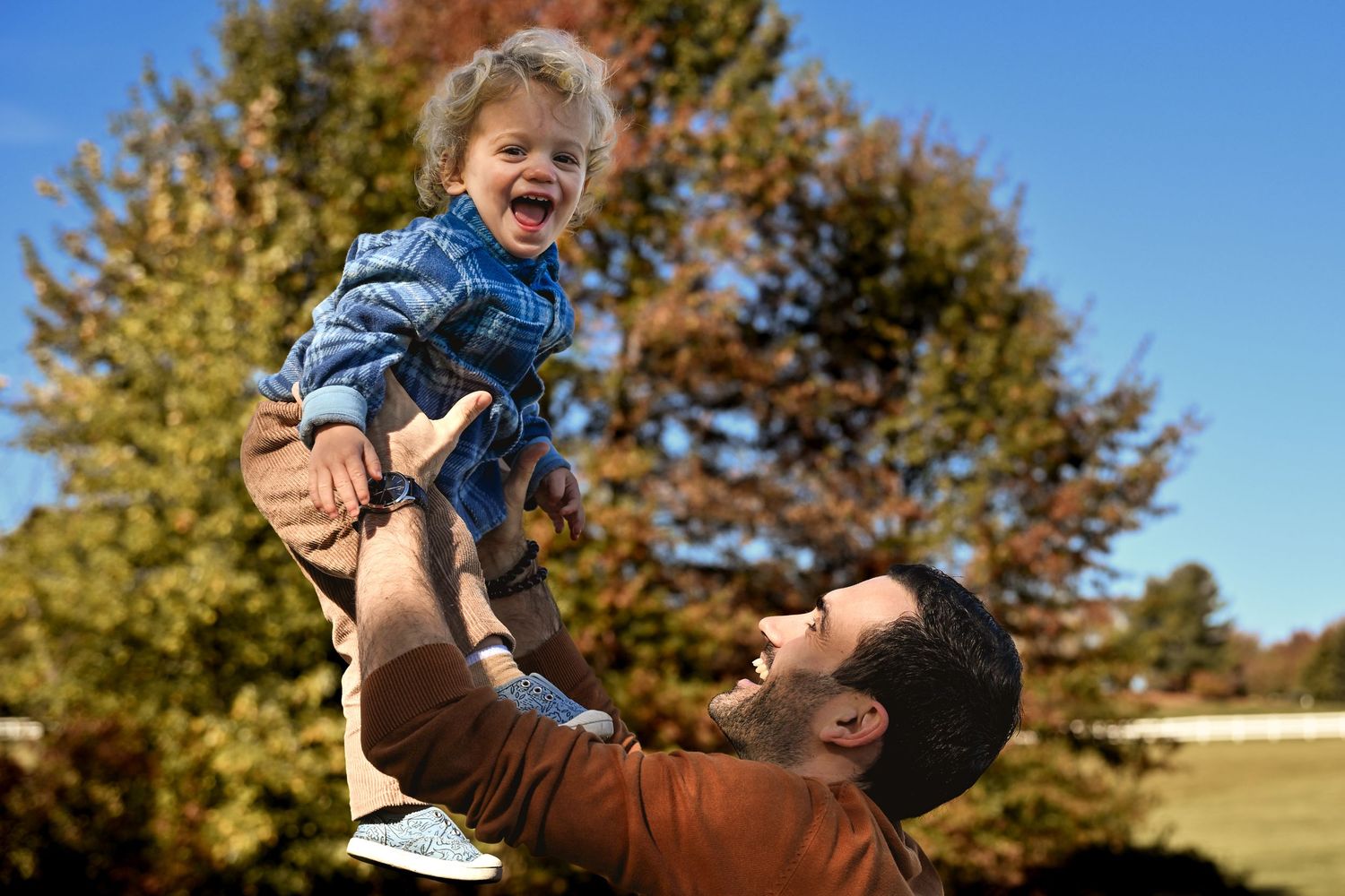 A playful sequence of autumn moments showing joyful interactions between parent and child in a park setting.