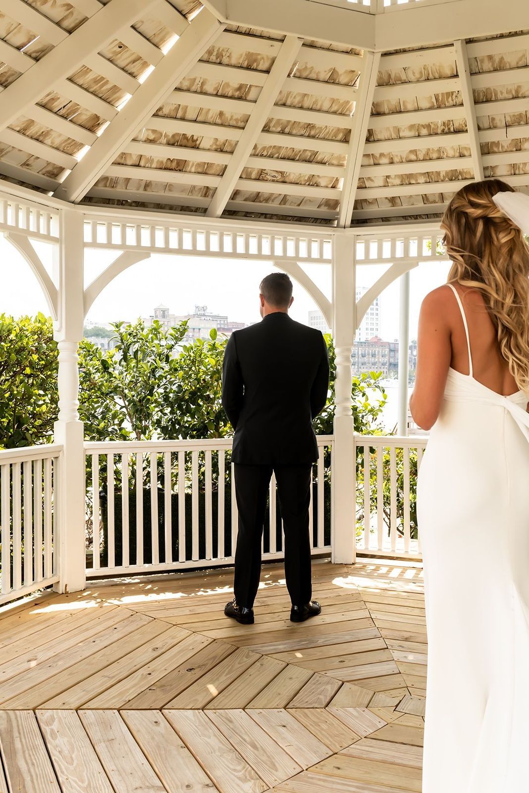 Bride greeting groom for first look at The Westin Savannah Wedding gazebo