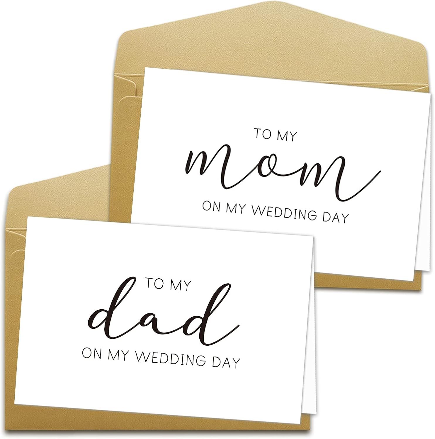 Elegant white and gold wedding day cards featuring cursive text for family members displayed in a stylish arrangement.