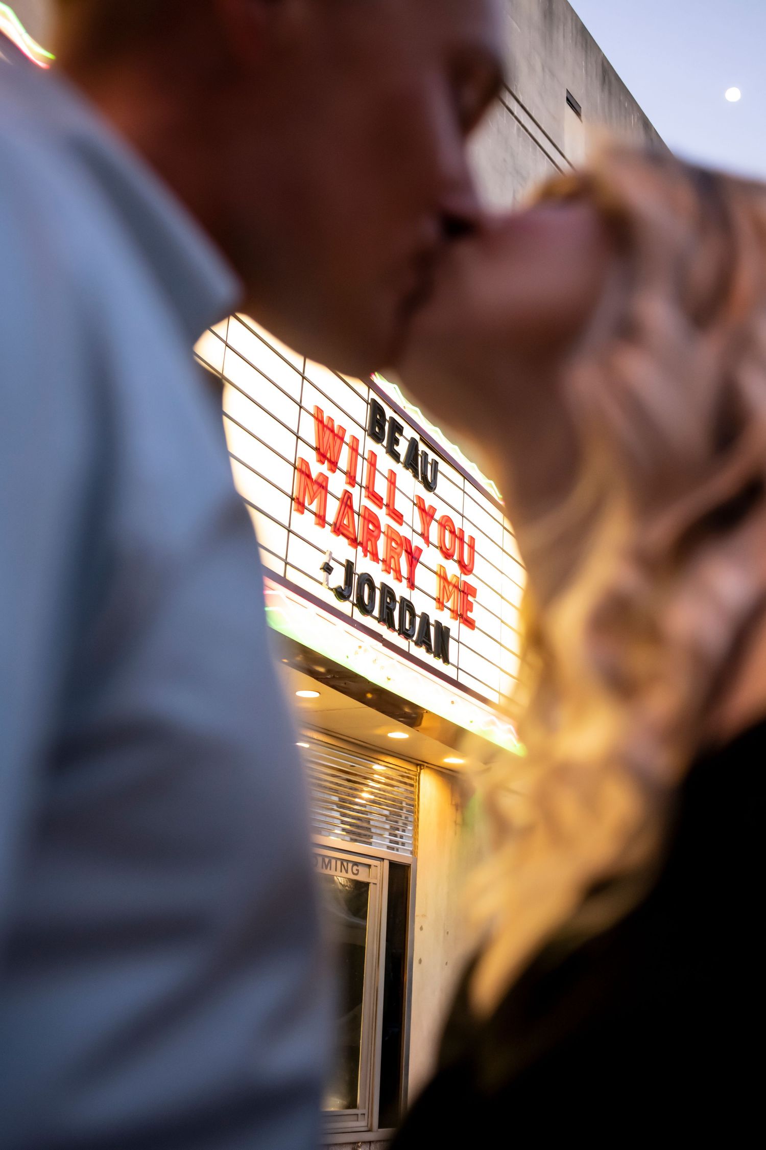 A couple proposes after proposal at the Savannah Theatre in Savannah, Georgia.