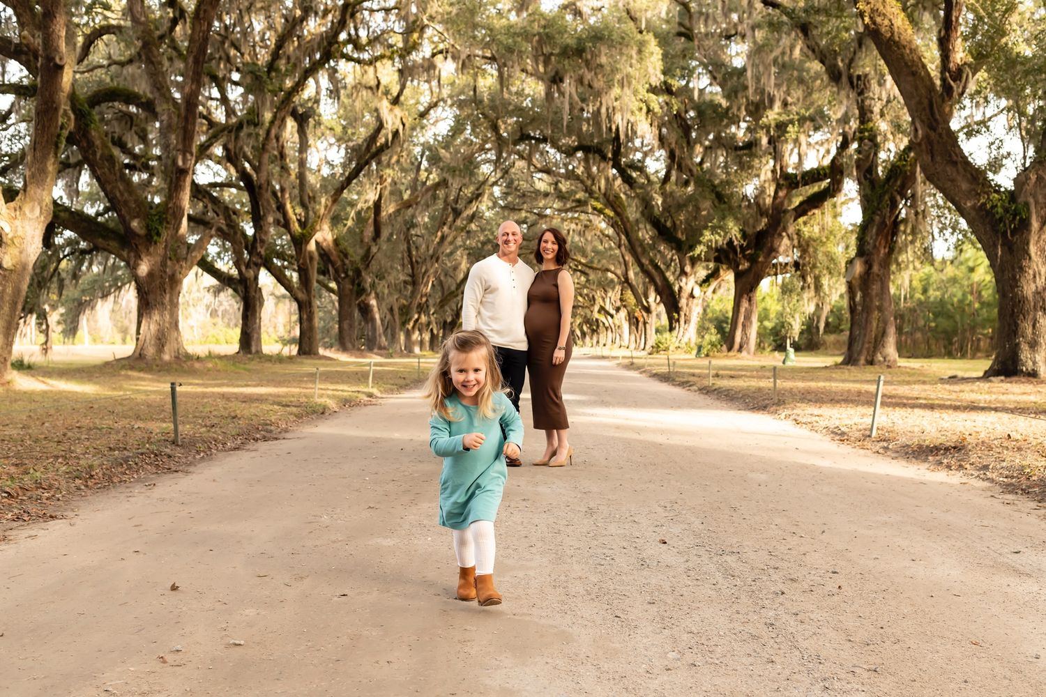 A sequence of five lifestyle photos shows a sun-dappled path through oak trees draped in Spanish moss.