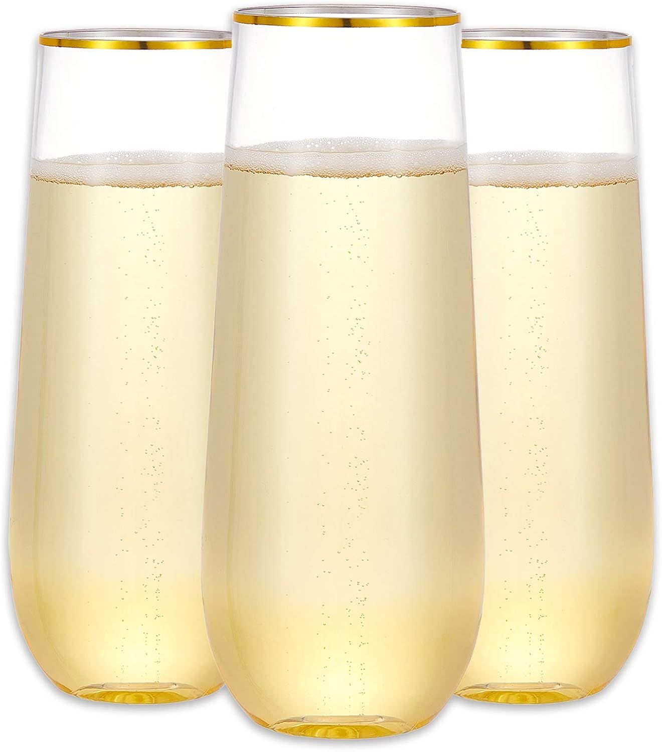 Crystal stemless wine glasses with gold rims filled with sparkling champagne lined up in a neat row.