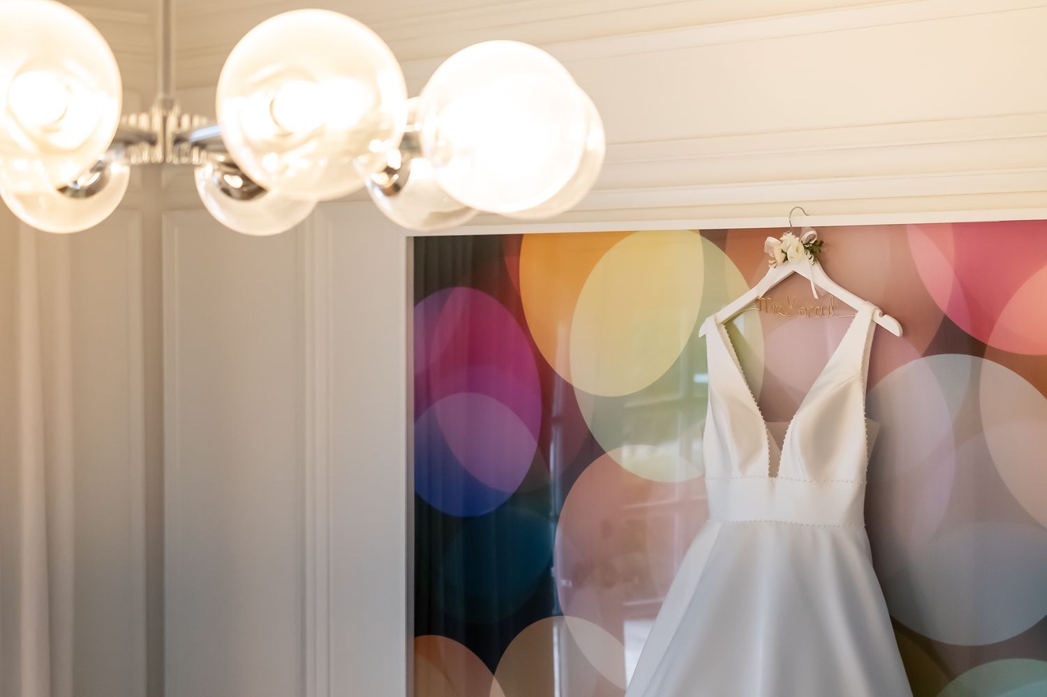 Wedding decor setup with white flowers and bokeh lighting creating a romantic atmosphere.