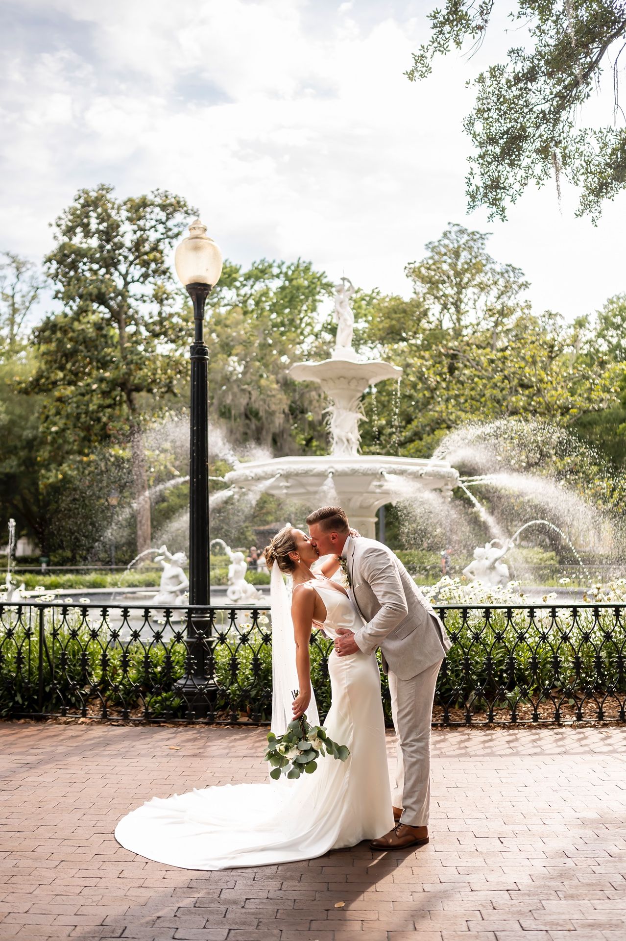 A romantic four-panel sequence of a wedding couple on a brick patio with ornate iron railings and garden fountains.