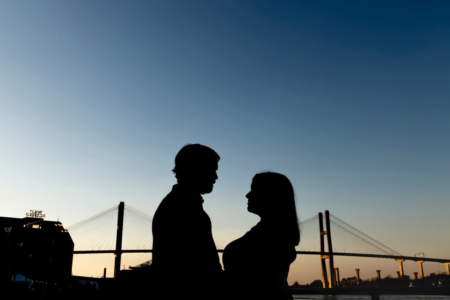 Savannah engagement photos on River Street at sunset.