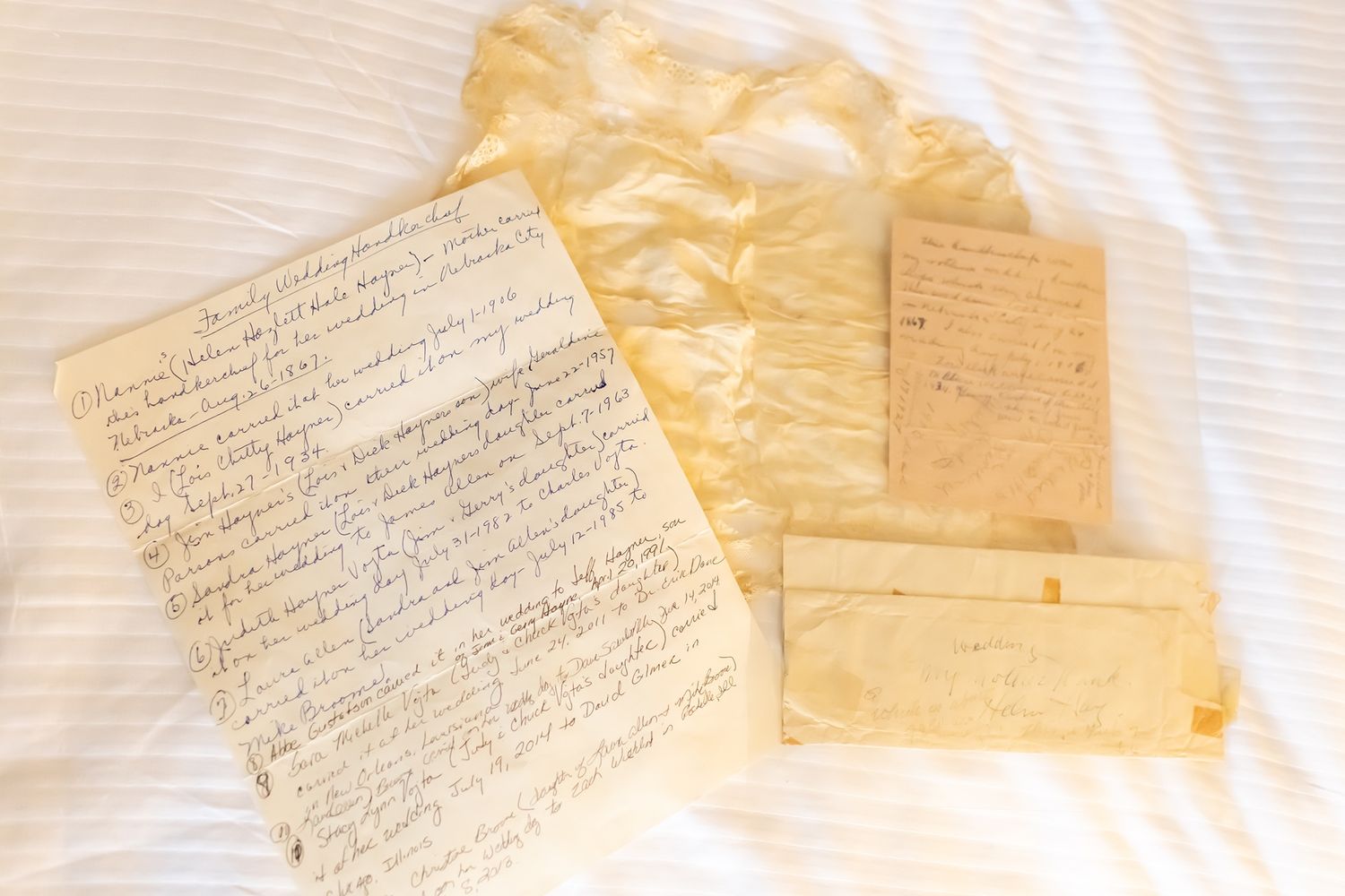 Old handwritten letters and vintage paper documents illuminated by soft natural light.