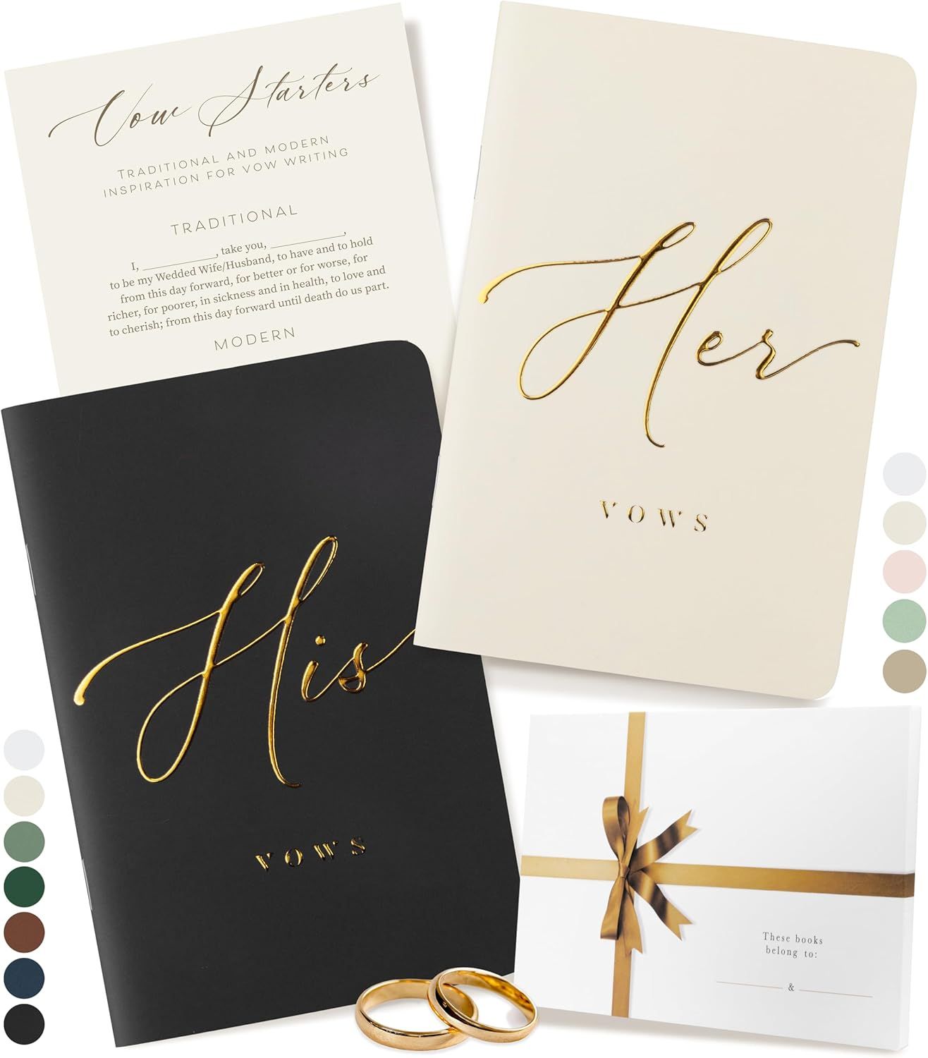 Wedding vow books in black and ivory with gold script lettering displayed with golden rings and gift packaging.