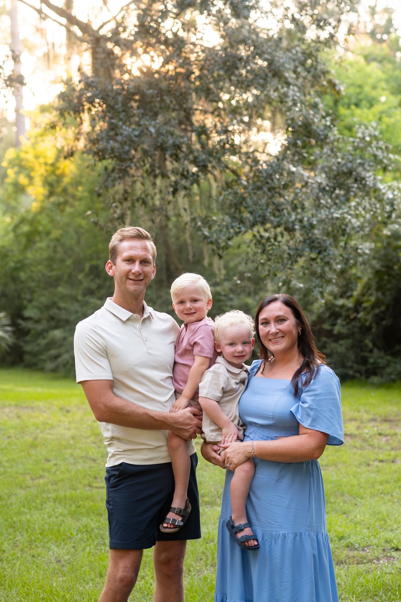 A family stands together at six oaks cemetery for a family portrait on Hilton Head Island in South Carolina.