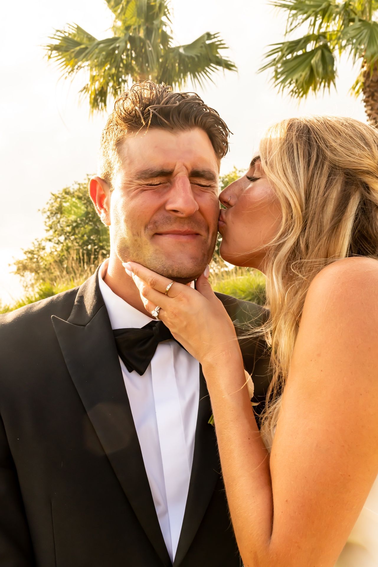 Romantic series of candid wedding photos captured during golden hour capturing tender moments between newlyweds.