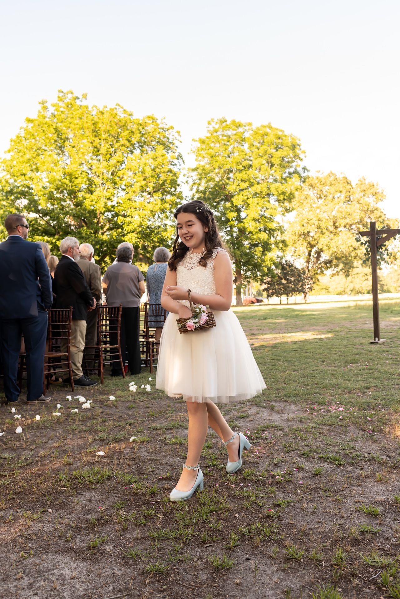 A sequence of photos shows a dancing scene at an outdoor wedding ceremony with autumn trees in golden light.
