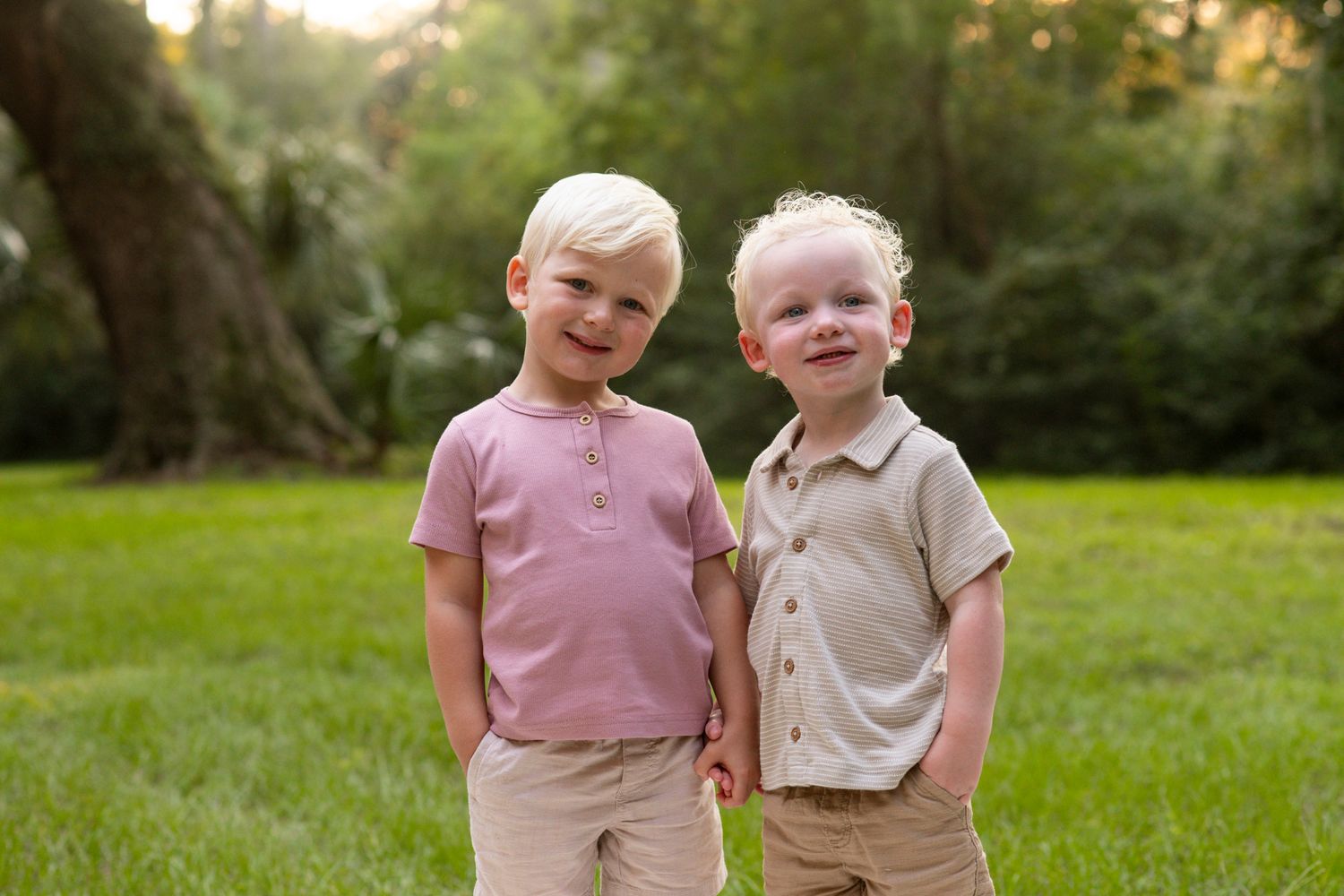 Kids playing beneath Spanish moss trees during Hilton Head family session