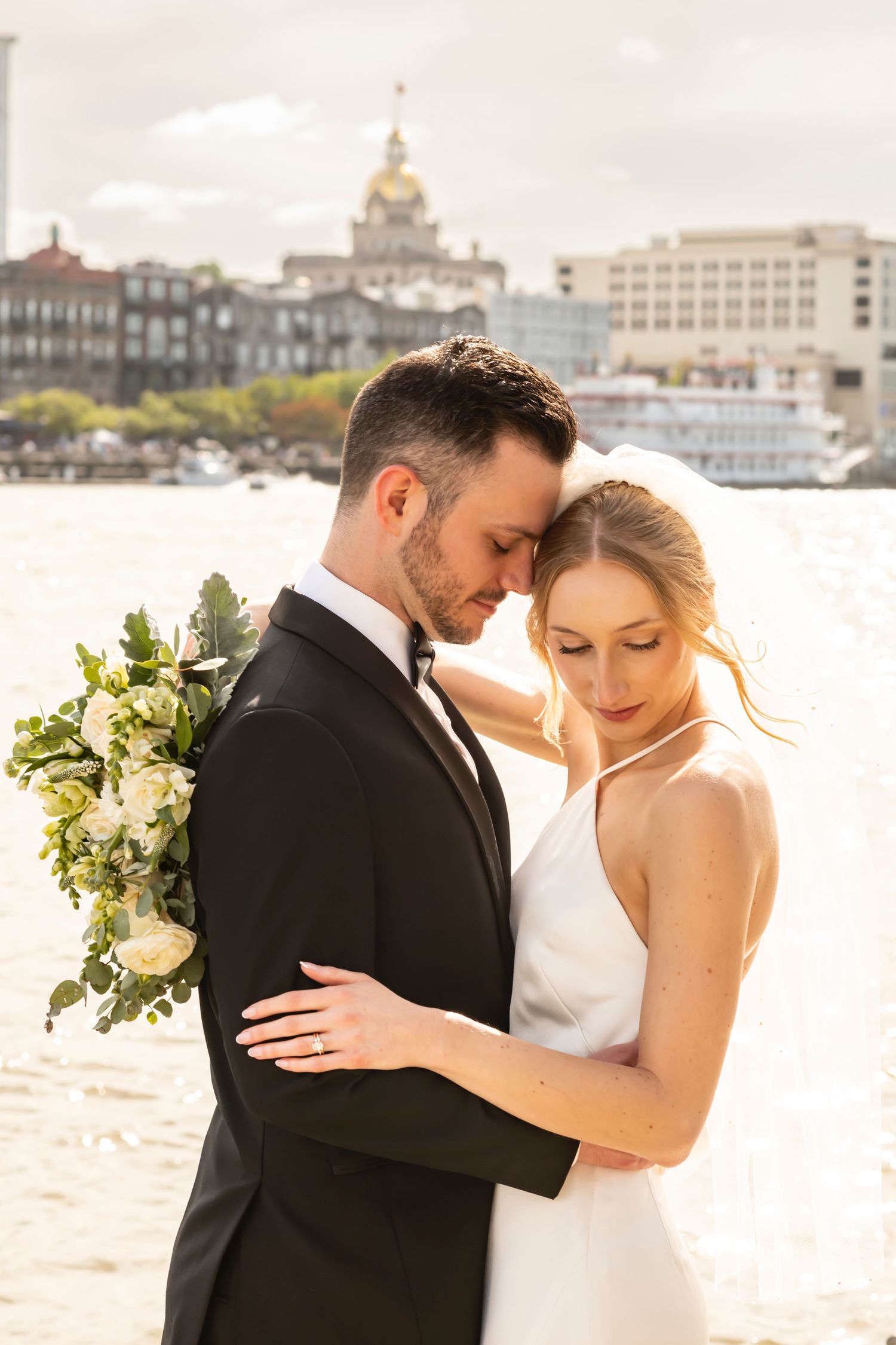 Bride and Groom portraits on the dock at The Westin Savannah Harbor in Savannah, Georgia.
