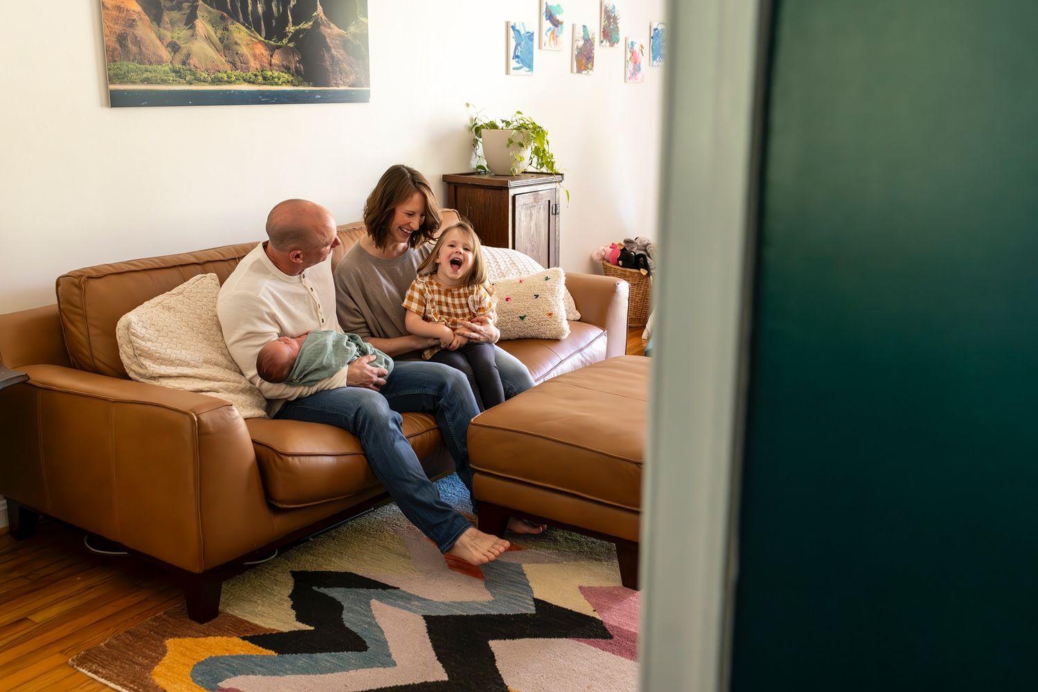 A series of candid moments showing a couple relaxing together on a brown leather couch.