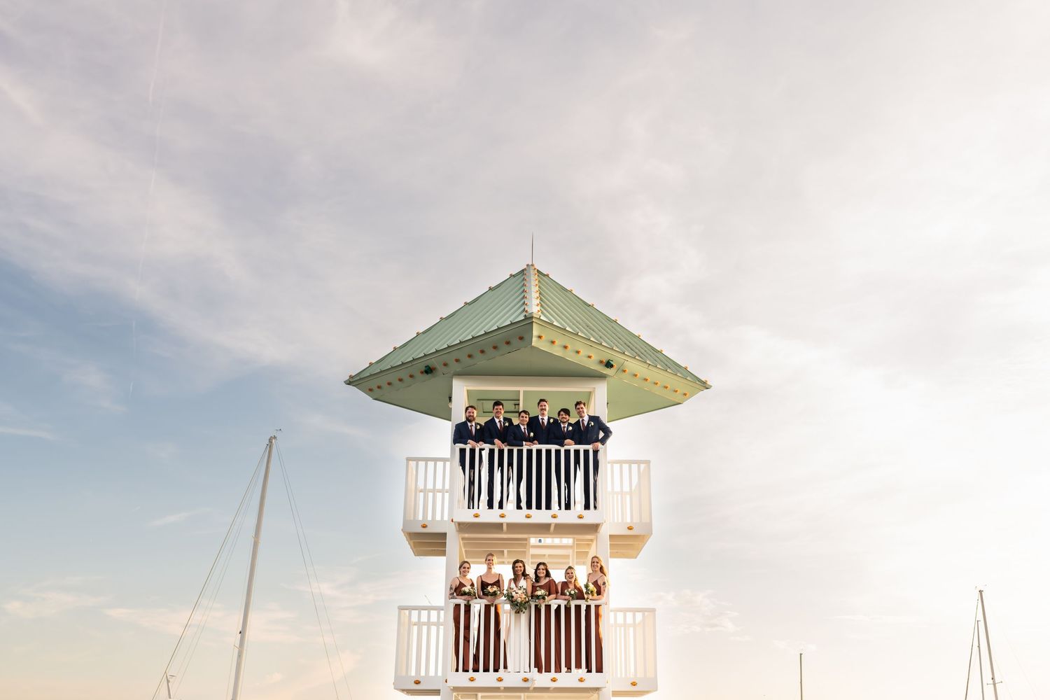 Wedding party stands in a tower at Savannah Yacht Club.