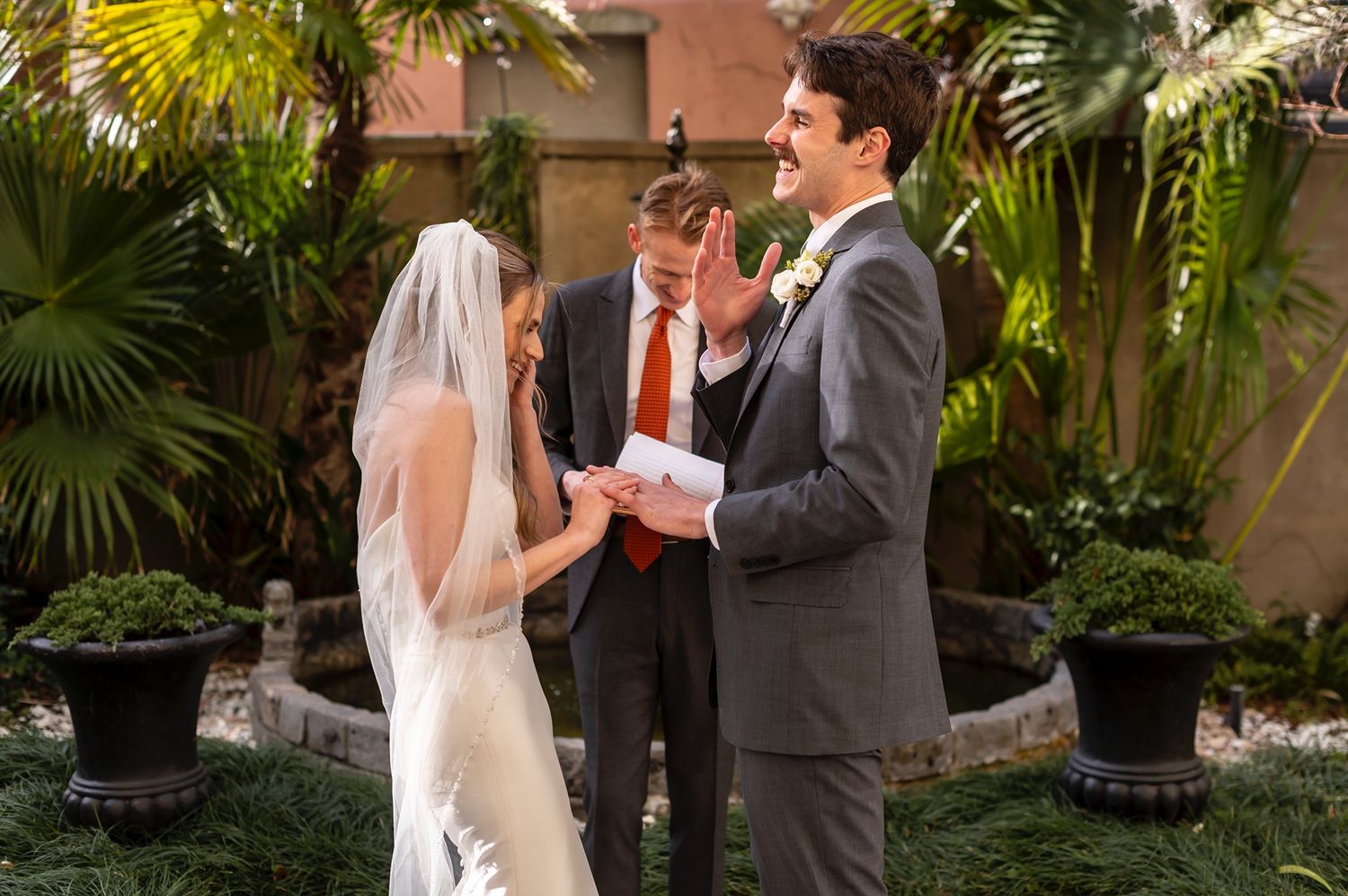 A sequence of wedding ceremony moments captured in a lush garden with palm trees and terracotta walls.