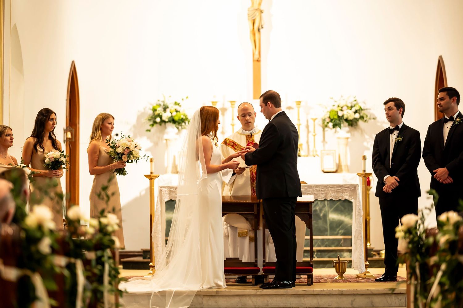 A series of five wedding ceremony photos showing moments from a traditional church ceremony with floral decorations.