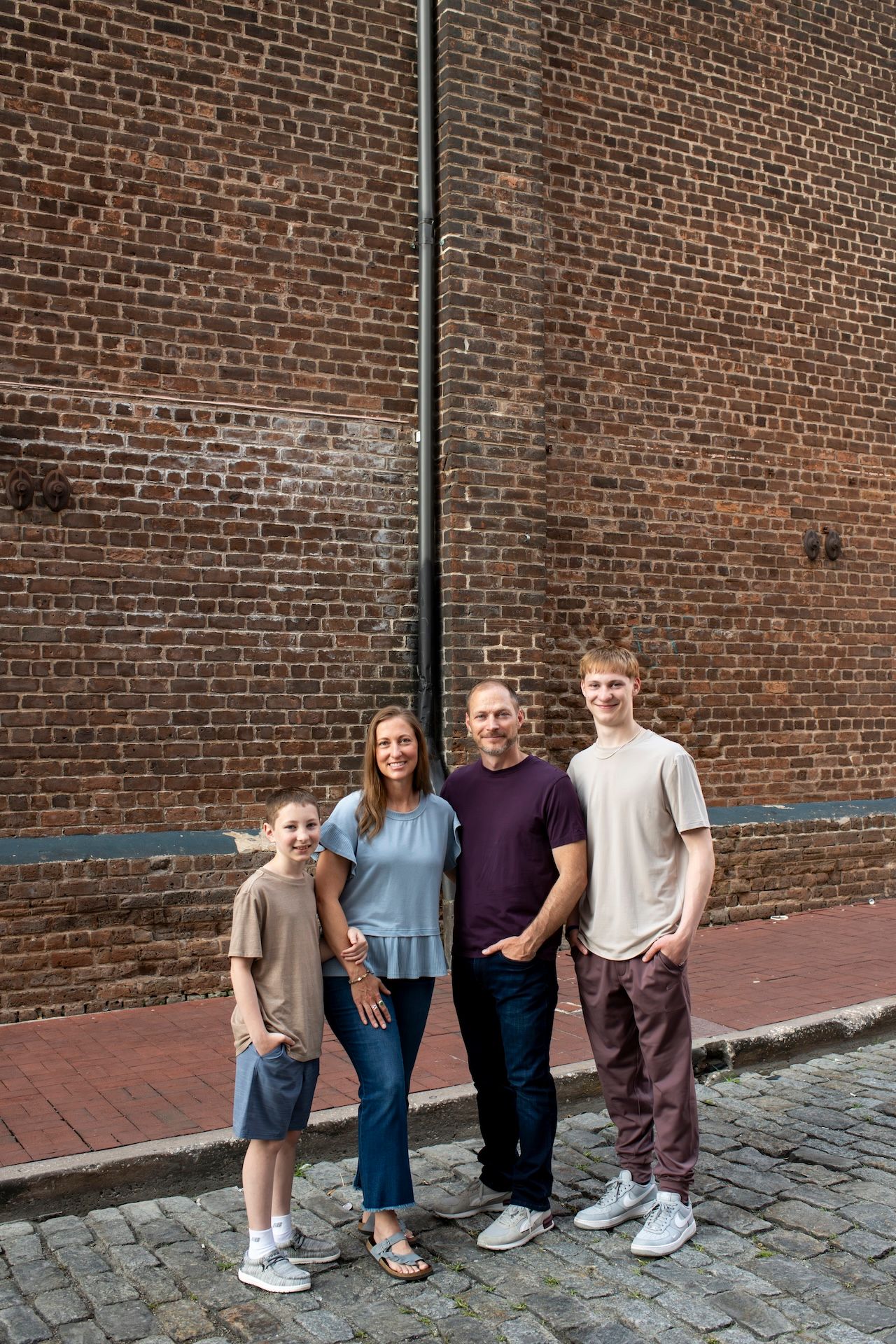 Family portrait on River Street in Savannah, Georgia.