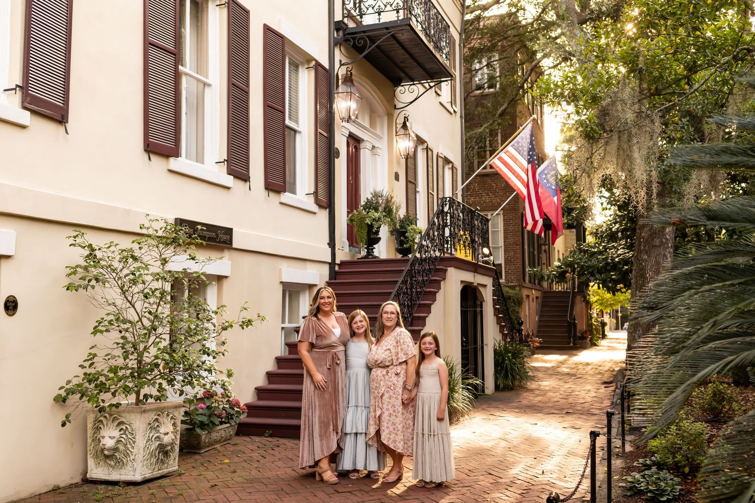 Girls on a charming historic cobblestone street in Savannah, Georgia.