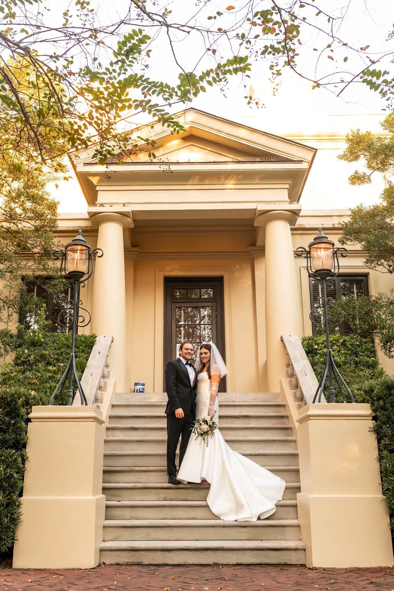 A sequence of sunset wedding photos showing a couple posing on elegant cream-colored stone steps with classical columns.