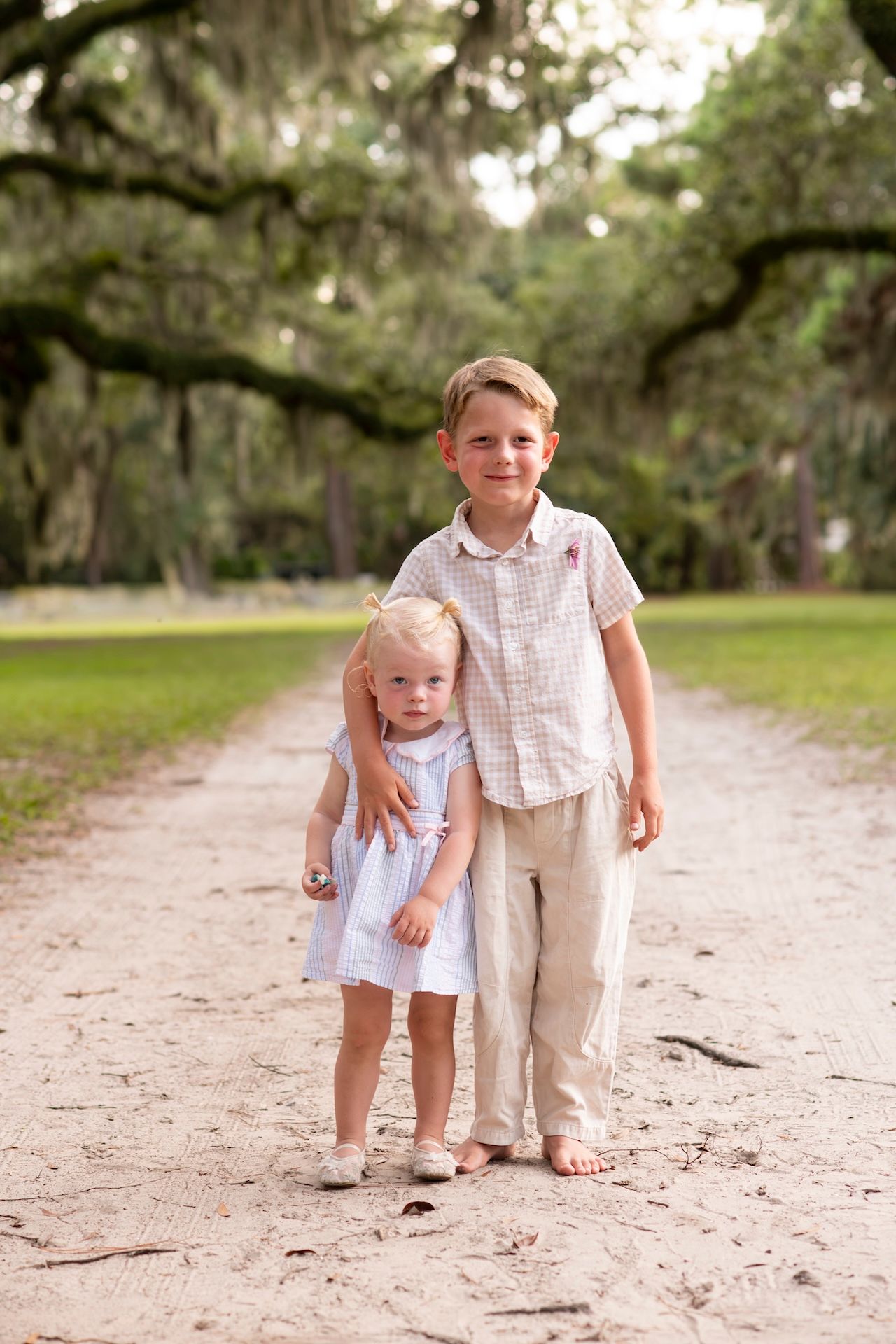 Siblings together beneath the live oaks at Six Oaks in Sea Pines.