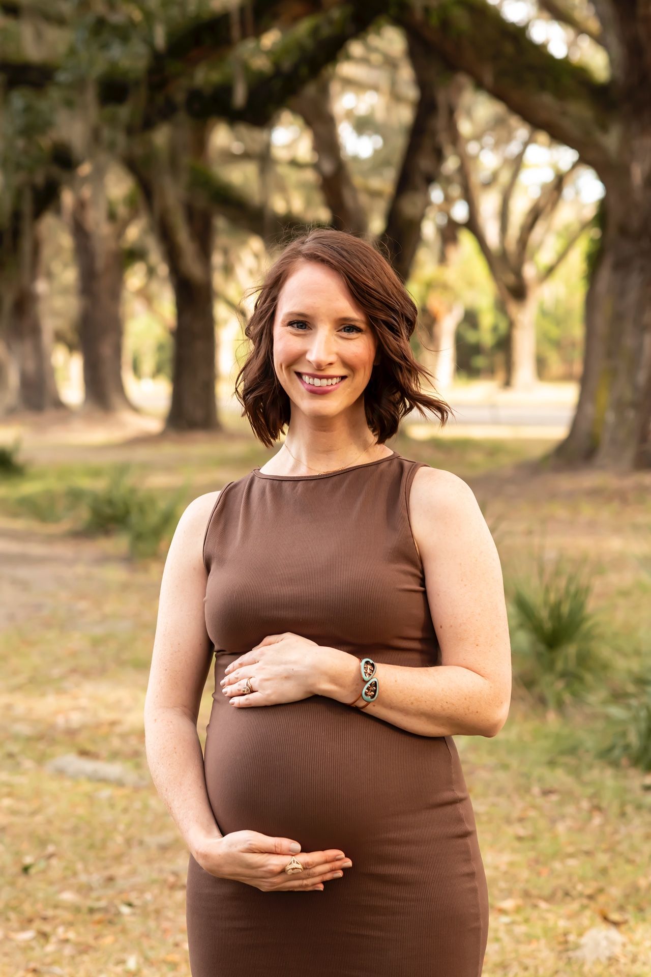 A series of maternity photos captured outdoors showing a pregnancy progression in a brown dress against a natural backdrop.