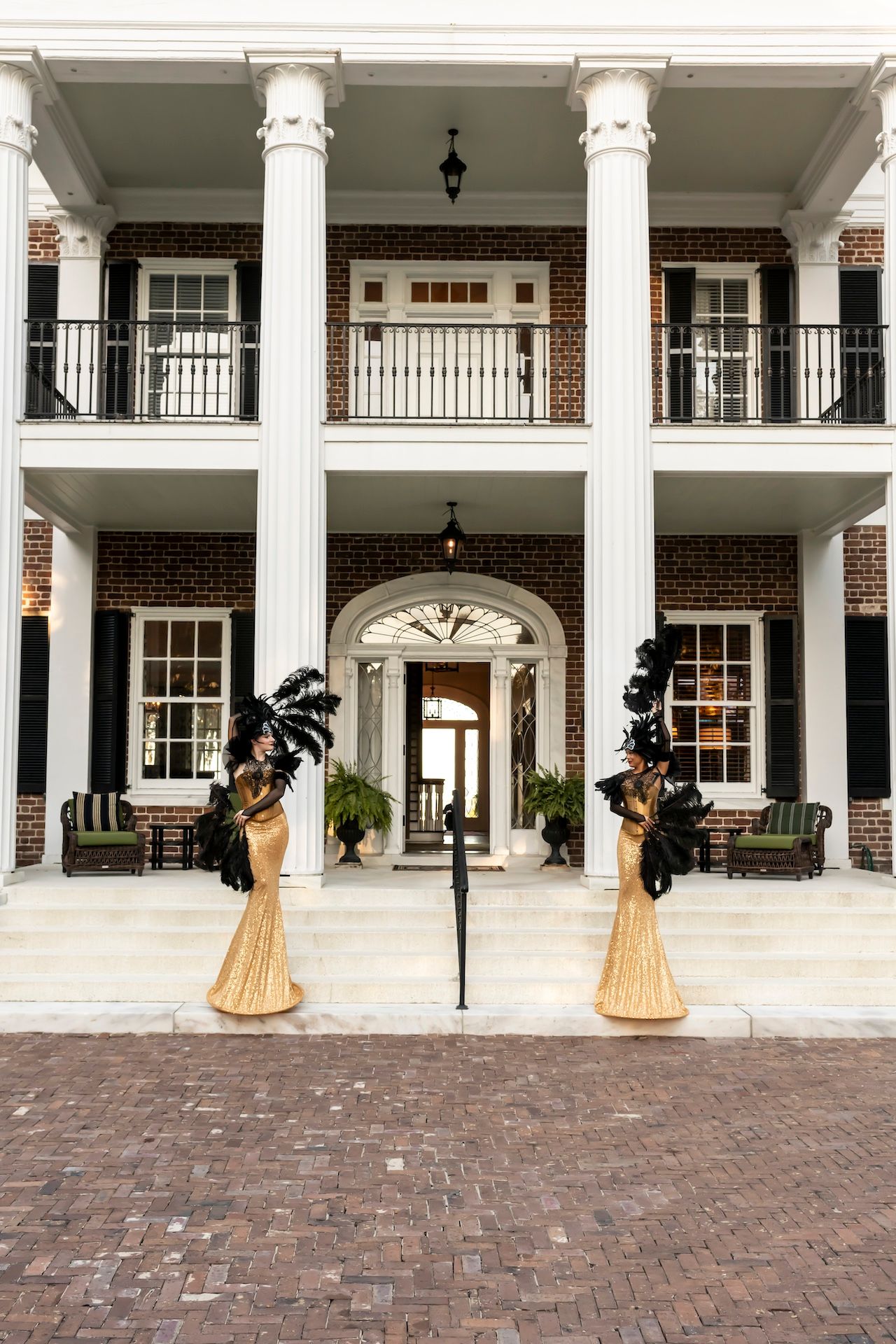 A series of four photos showing a ceremonial ring bearer pillow on brick steps in front of a grand white columned mansion.