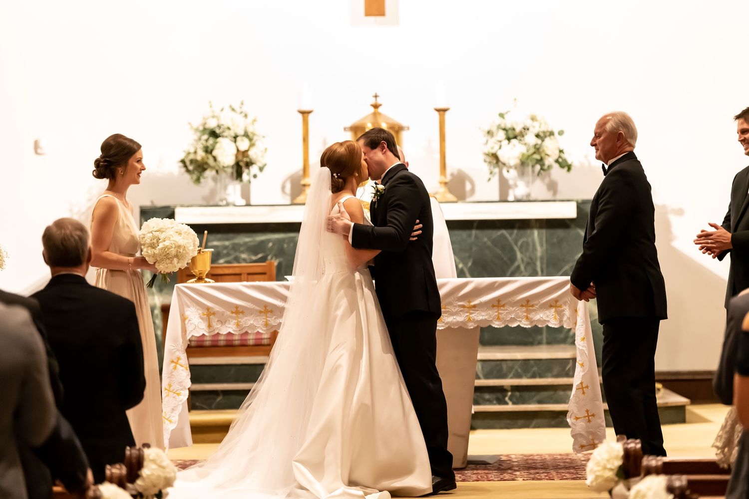 Four connected wedding ceremony photos showing a couple at the altar of a traditional church during their marriage service.