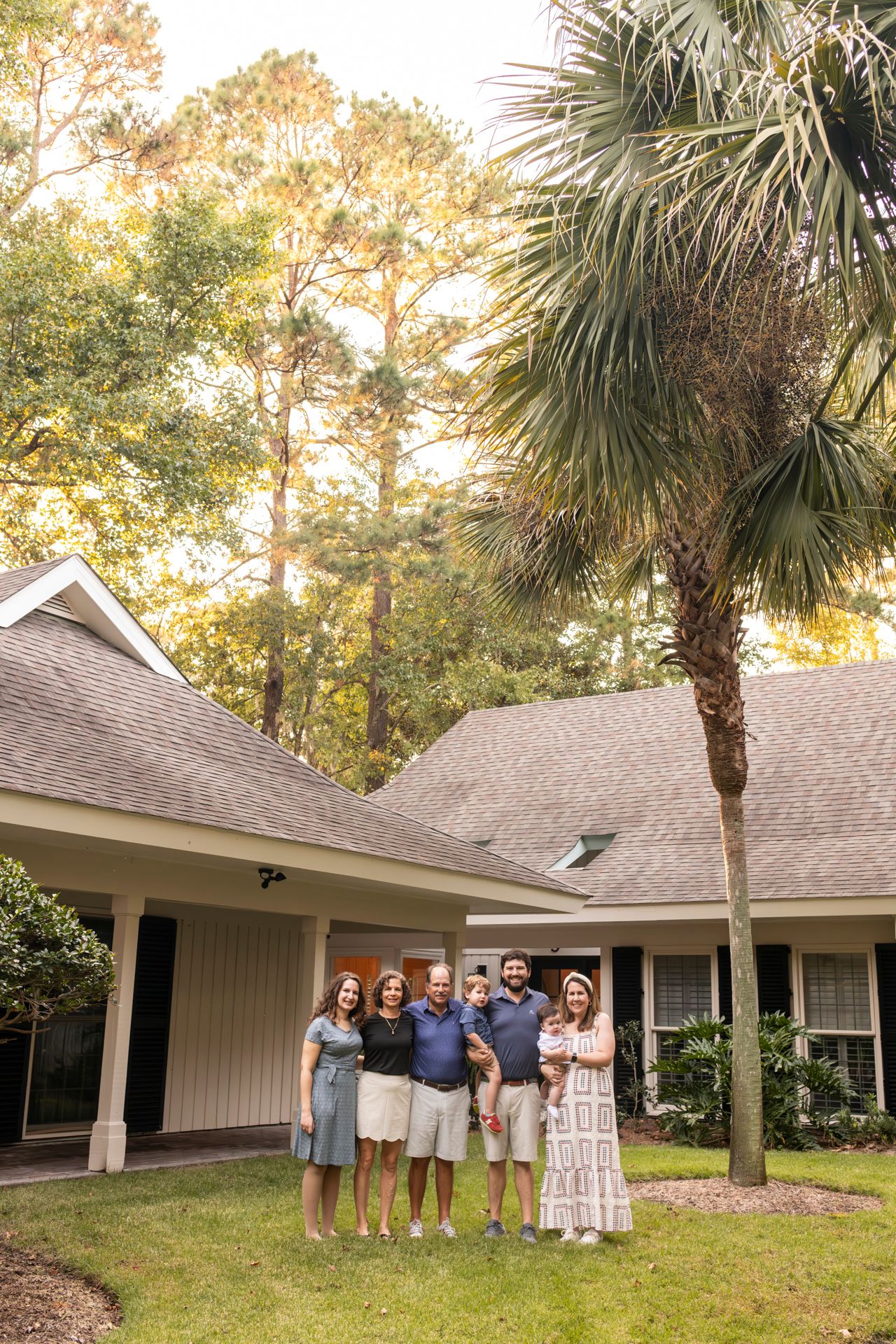 Extended family gathered outside vacation rental in Hilton Head