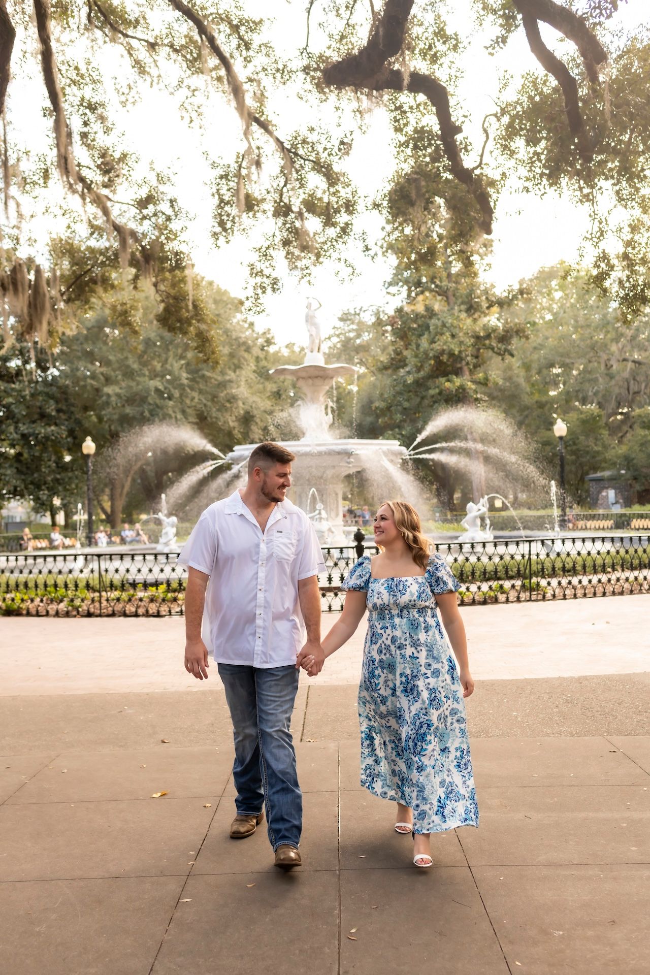 Engagement photos at Forsyth Park fountain in Savannah.