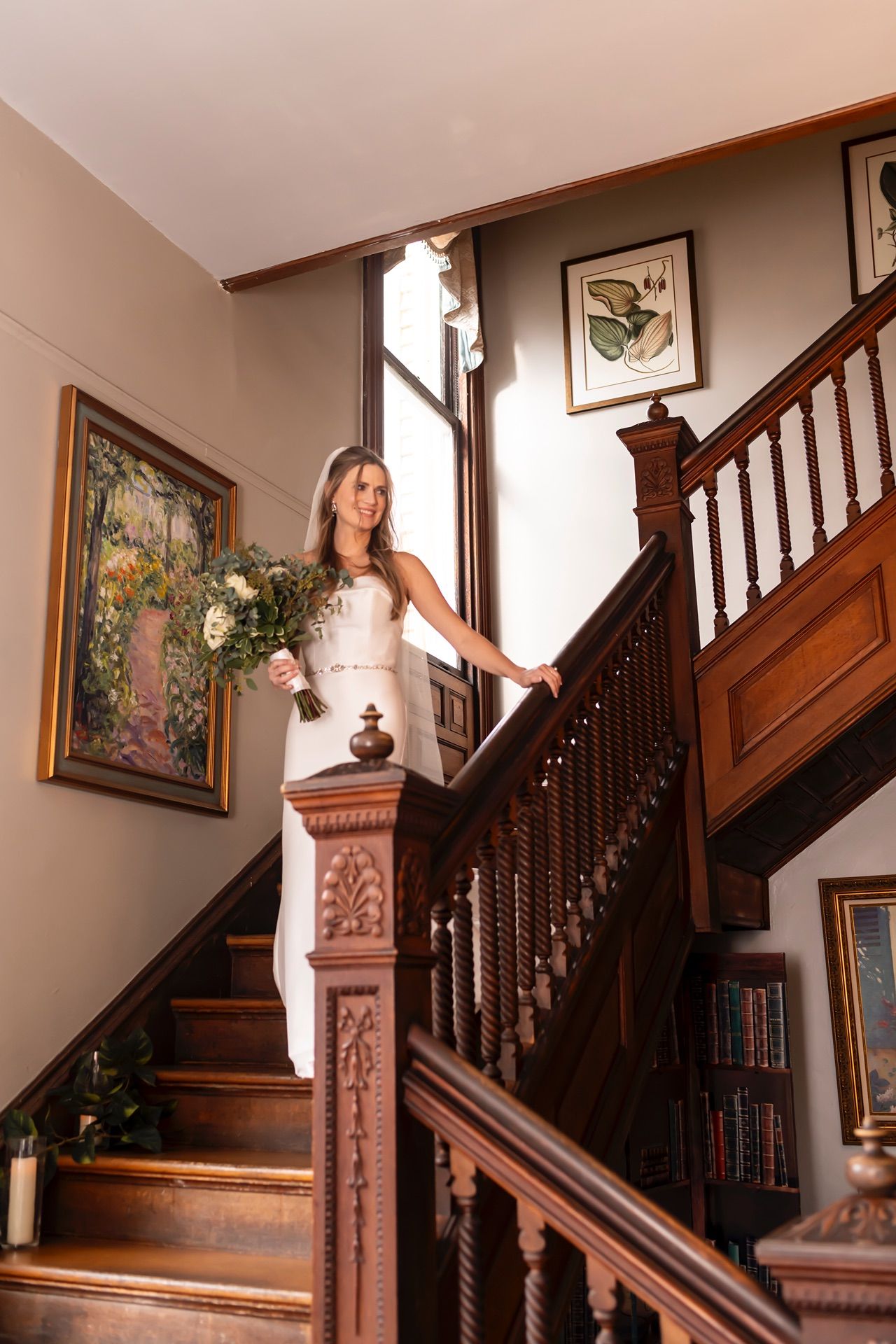 Four sequential photos showing someone gracefully descending an ornate wooden staircase in a traditional home interior.