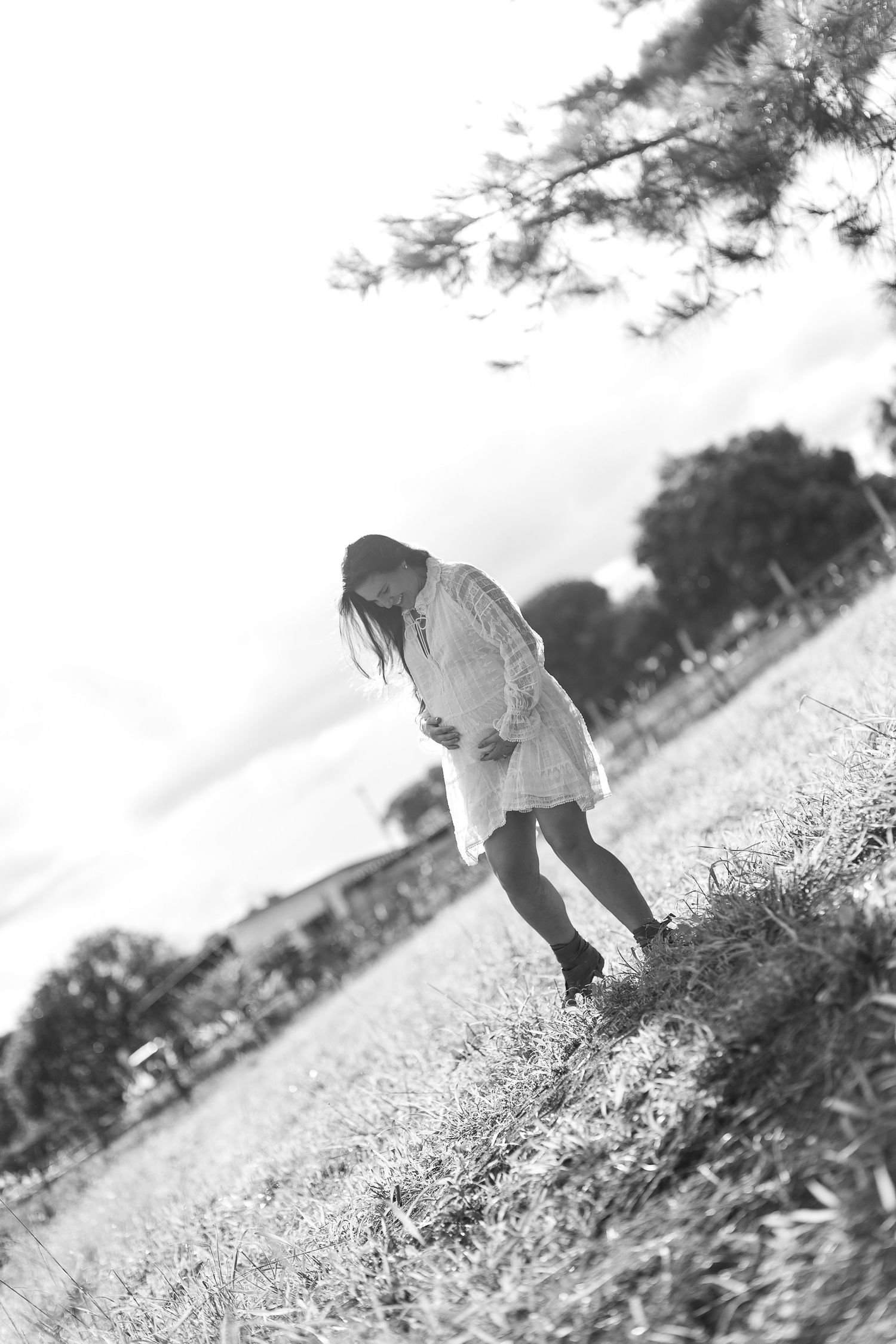 Black and white artistic series of movement captured in an outdoor field setting.