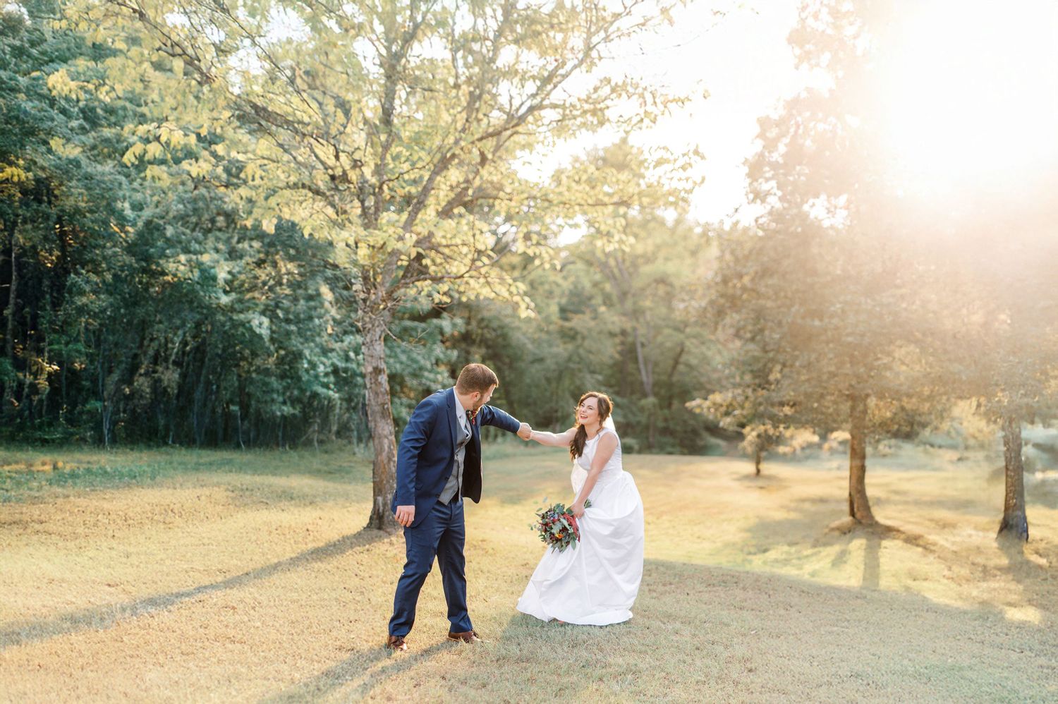Romantic sunset wedding portraits captured in a serene outdoor setting.   Wedding Photographer tyler tx