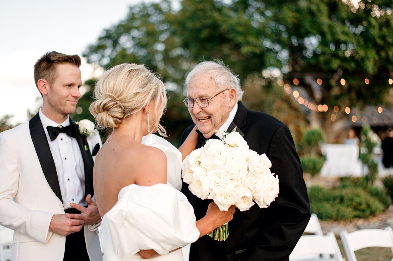 A collection of black and white wedding photos showing romantic moments between couples during their special day.