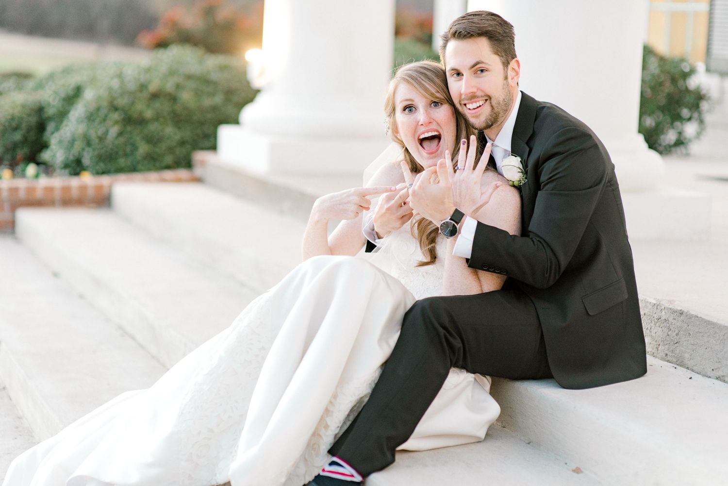 A bride and groom share intimate moments in a series of romantic wedding photos against a light colored backdrop.