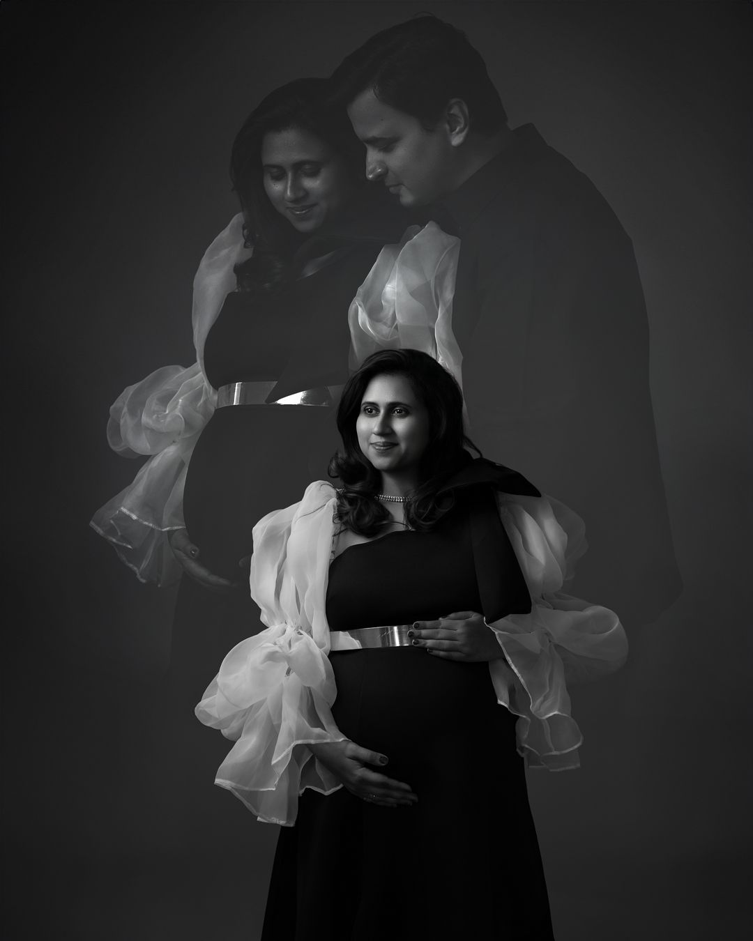 Romantic black and white portraits showing flowing fabric movement and intimate poses.