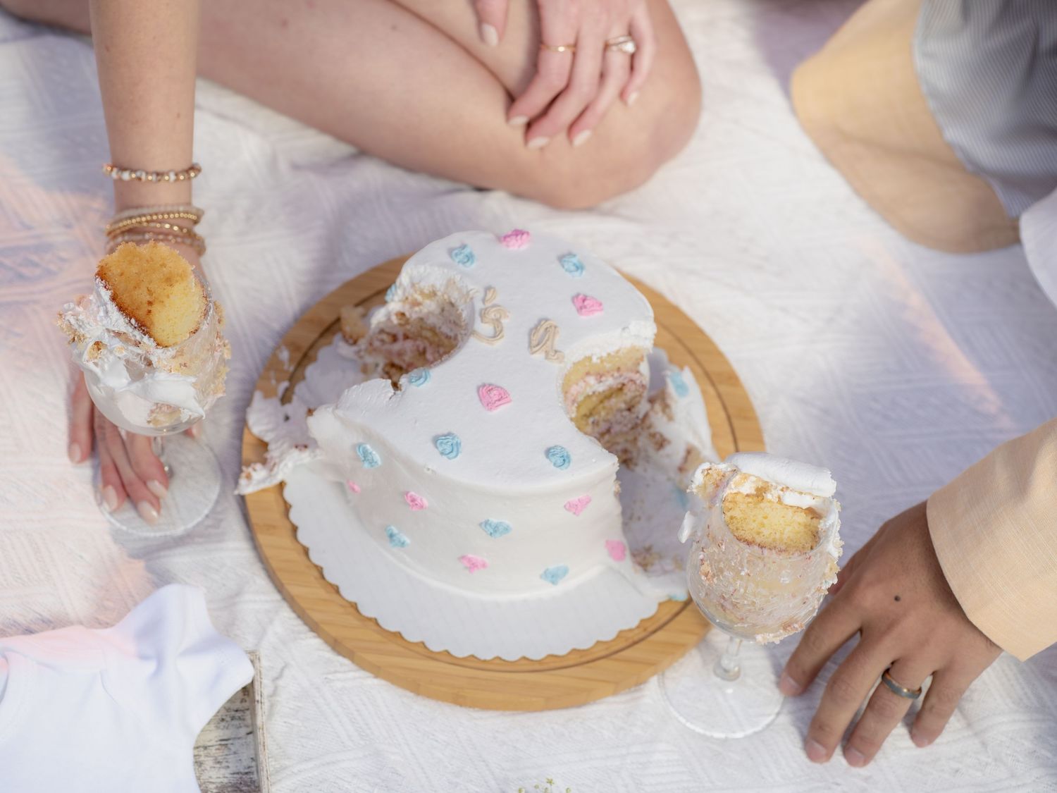 Close-up view of decorative plates and table settings with pastel colors and gold accents.
