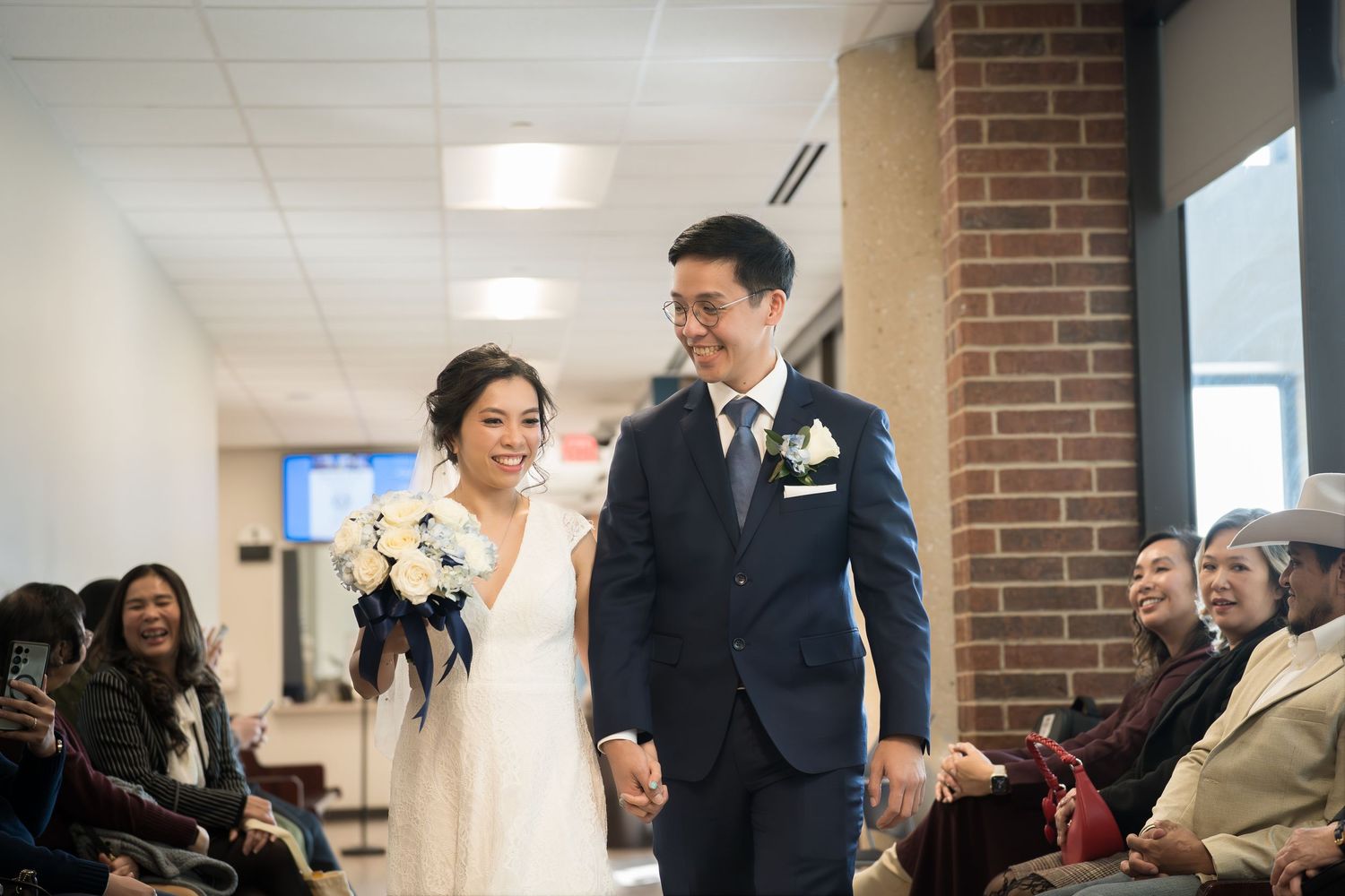 A wedding celebration sequence showing moments of joy in an indoor venue.