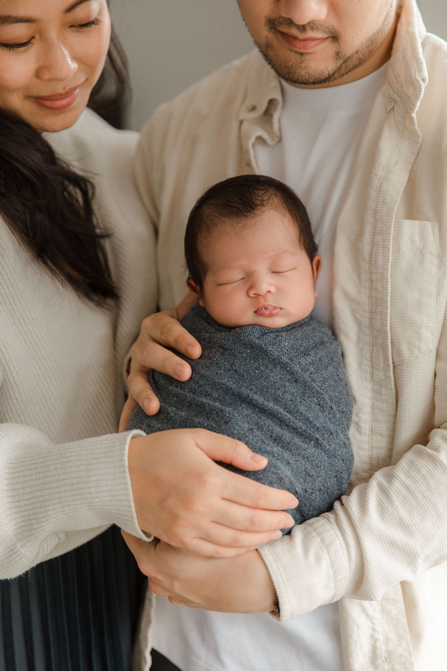 Newborn baby peacefully sleeping during an in-home session in San Jose