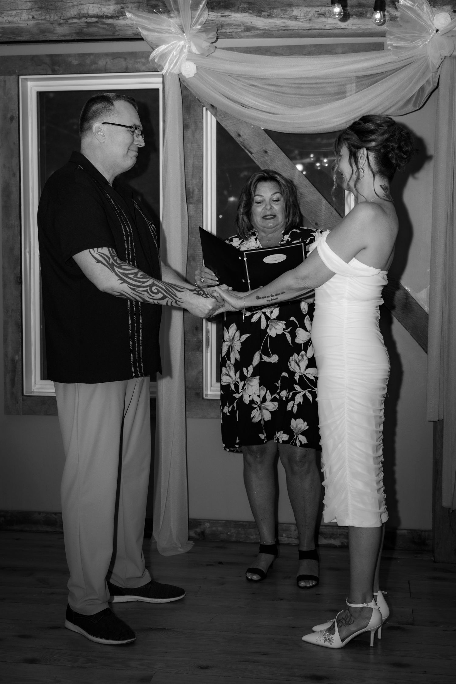 Couple sharing their vows during small wedding celebration