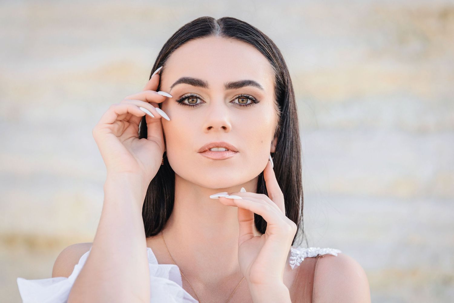 Close up beauty portrait with soft lighting and ethereal atmosphere in a natural outdoor setting.
