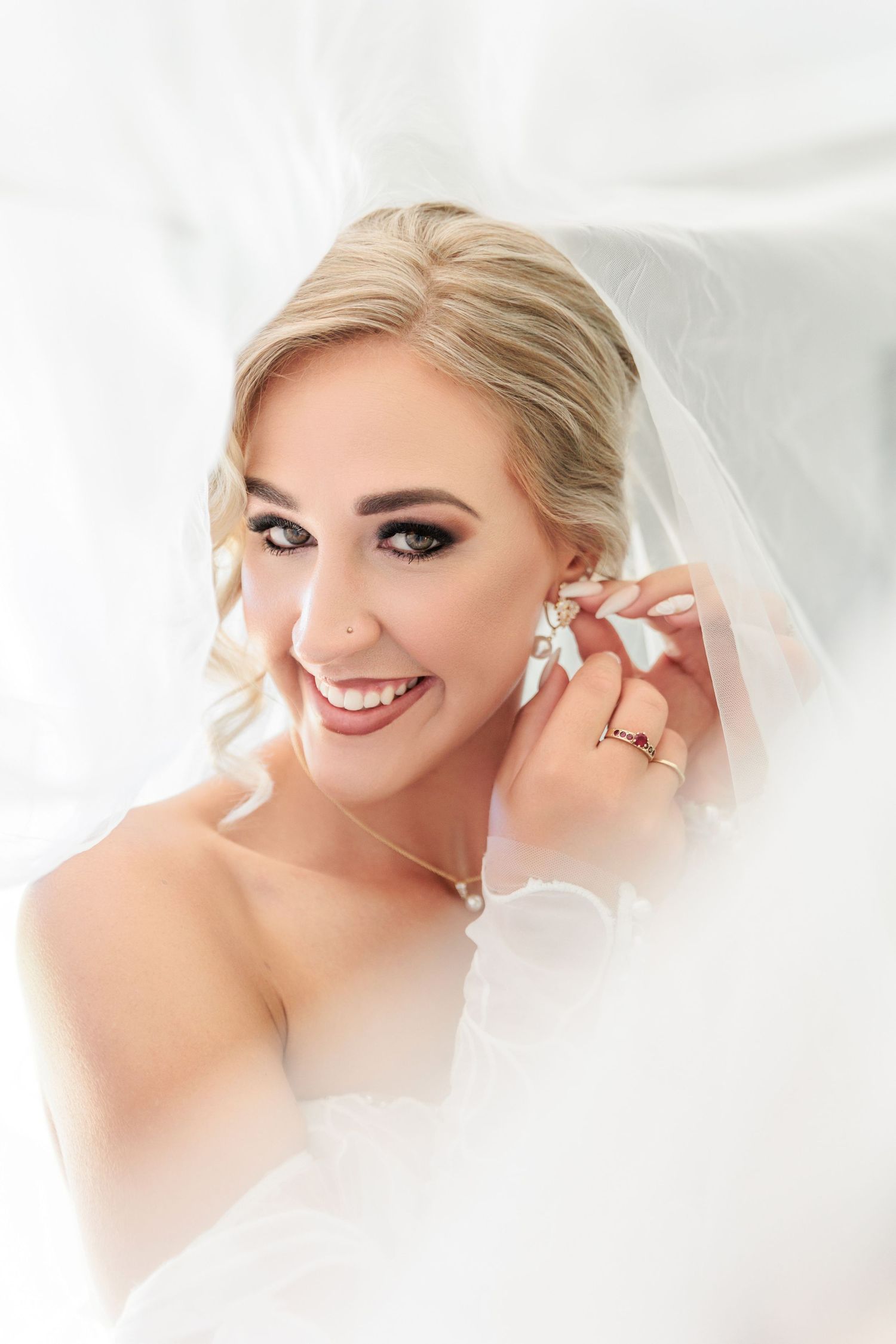 A collage of bridal portraits showing delicate earring details and soft romantic styling with ethereal lighting.