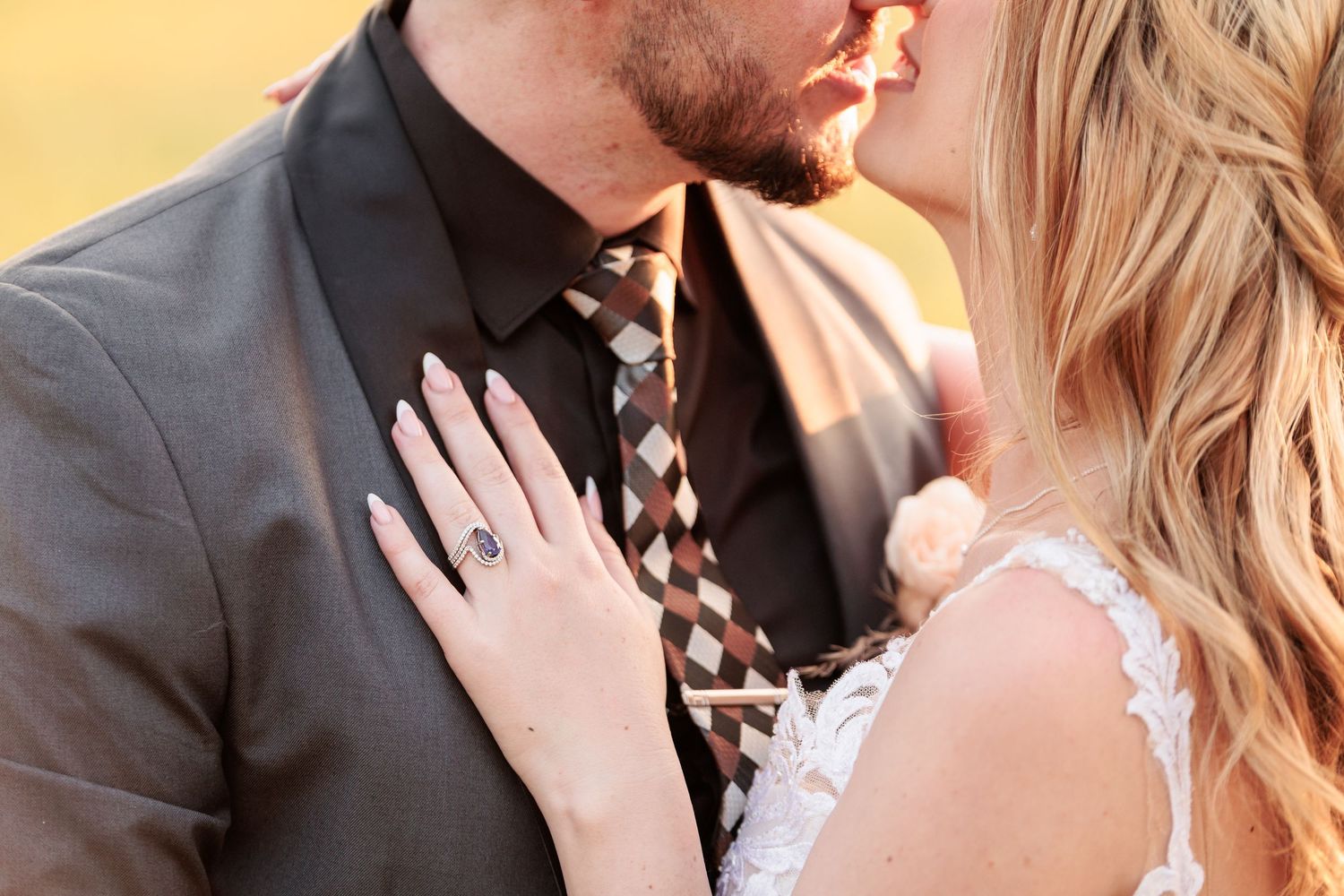 A romantic couple shares intimate moments in a series of engagement or wedding photos at sunset.