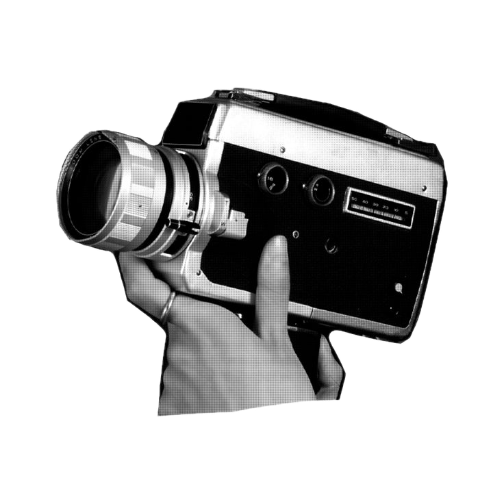 Hands holding a vintage Super 8 film camera, black and white photo of classic 1960s movie camera with zoom lens.
