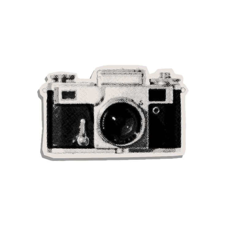 Black and white vintage rangefinder camera pin or brooch with detailed lens and body design on white background.