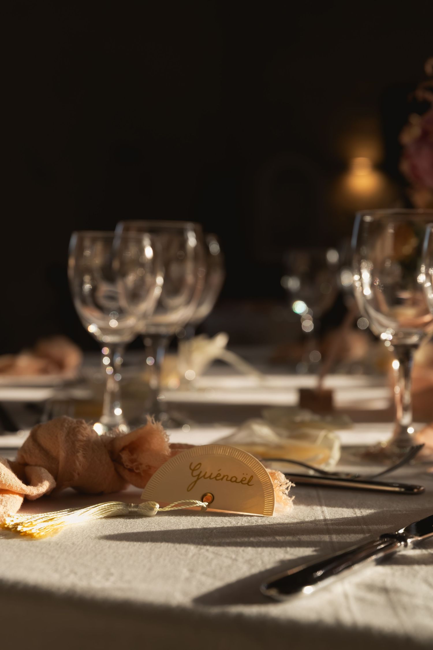 Elegant wedding table setting illuminated by soft morning light, captured in an editorial wedding photography style.