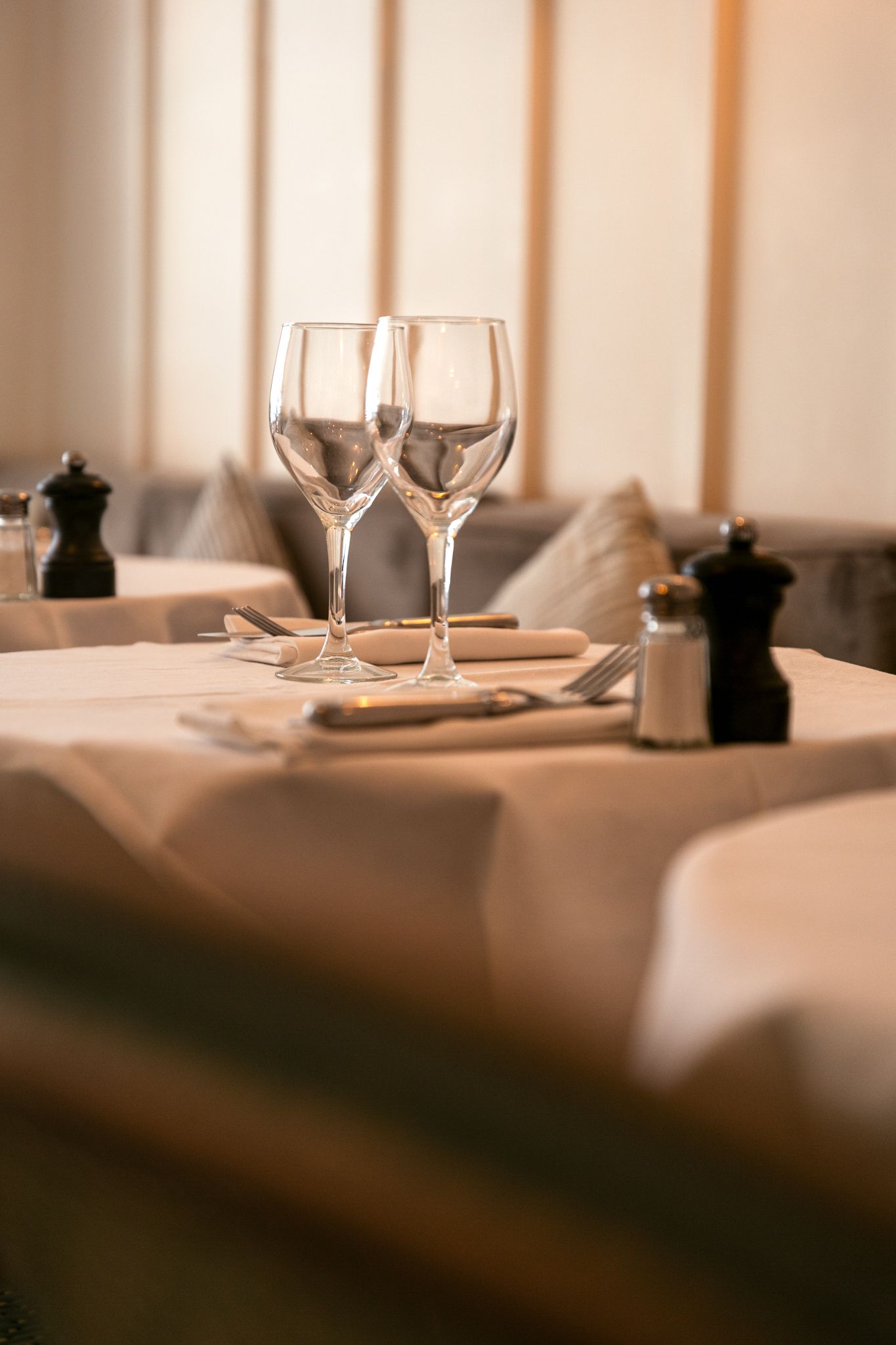 Soft-toned dining room interior at Amourette restaurant in Paris